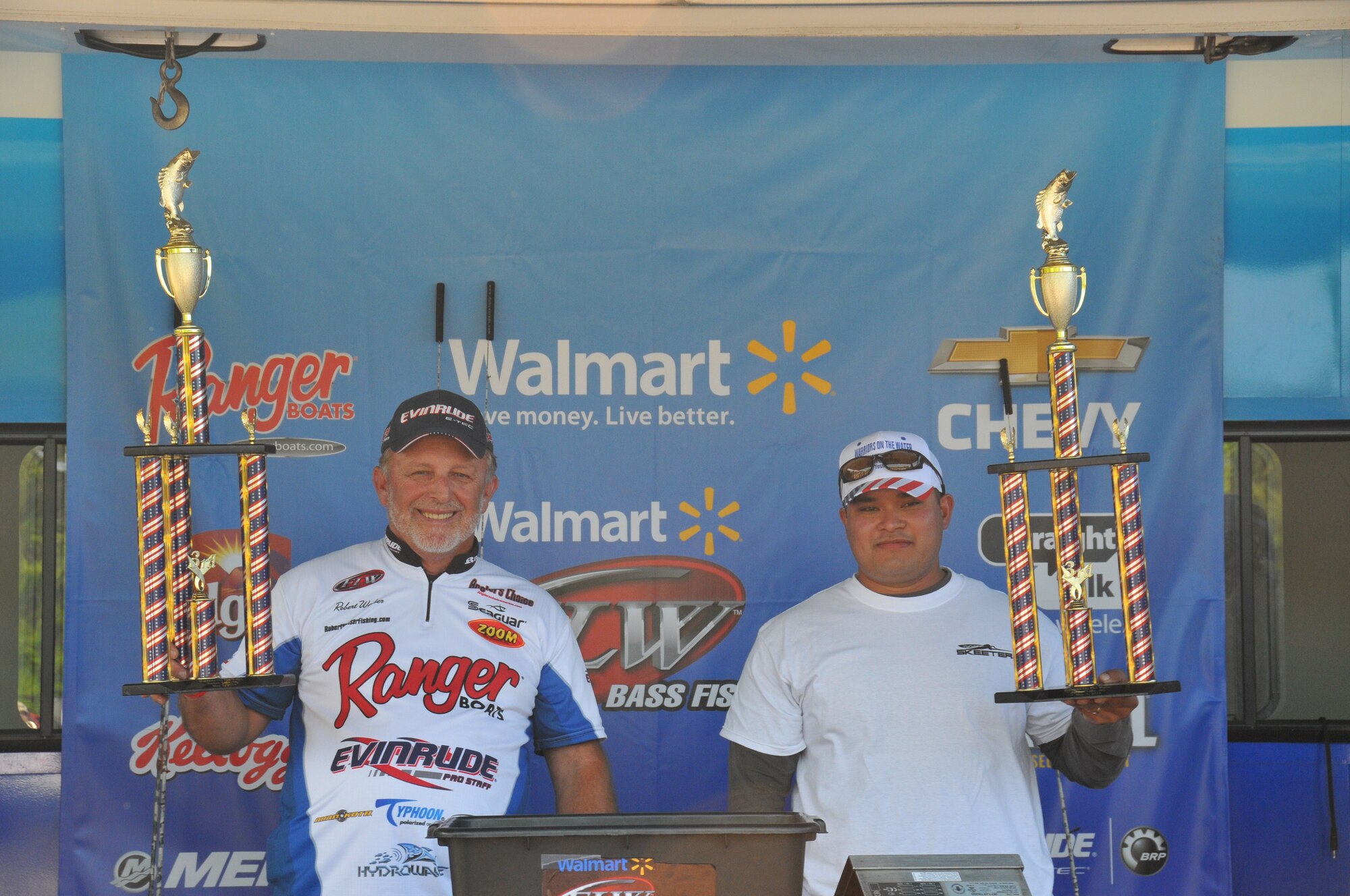 JORDON LAKE STATE PARK, N.C. - Robert Walser, Lexington N.C., (left) and U.S. Army Sgt. Robert Crisostomo, HSC, XVIII Airborne Corps, Fort Bragg, N.C., took third place in the 9th Annual Warriors on the Water Military Appreciation Bass Fishing Tournament here, May 2.  Walser and Crisostomo’s catch for the day weighed in at 18 pounds, 10 ounces.  WOW is a non-profit organization that arranges the annual fishing tournament with volunteers who partner with members of the Armed Forces to show appreciation for their service.  (U.S. Air Force photo by Adam Luther)