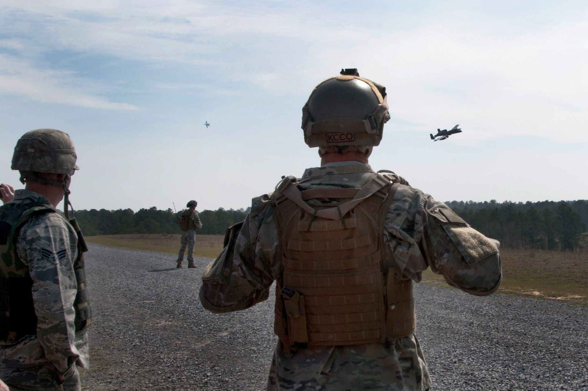 The 122nd Air Support Operations Squadron, Louisiana Air and Army National Guard, call close air support (CAS) to the A-10 Thunderbolt II aircraft above. The 190th Fighter Squadron "Warthog" pilots trained with the CAS missions at the Army range training grounds near Fort Polk, March 21 while deployed to Barksdale Air Force Base. (Air National Guard photo by Master Sgt. Becky Vanshur)









