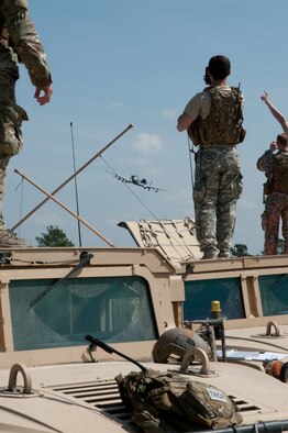 The 122nd Air Support Operations Squadron, Louisiana Air and Army National Guard, call close air support (CAS) to the A-10 Thunderbolt II aircraft above. The 190th Fighter Squadron "Warthog" pilots trained with the CAS missions at the Army range training grounds near Fort Polk, March 21 while deployed to Barksdale Air Force Base. (Air National Guard photo by Master Sgt. Becky Vanshur)


