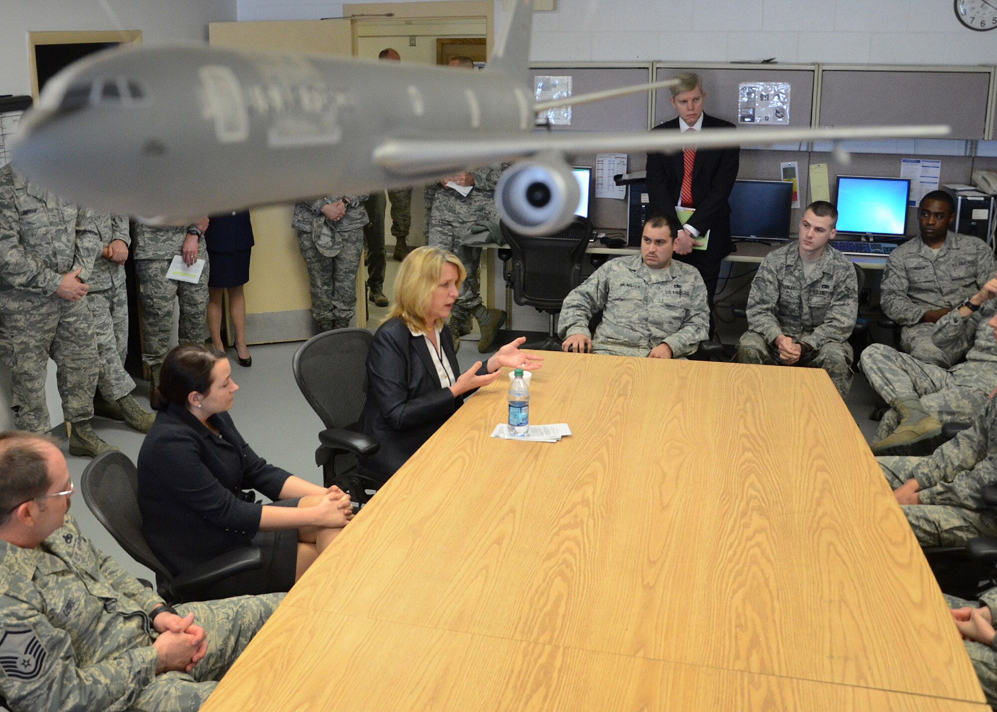 PEASE AIR NATIONAL GUARD BASE, N.H. -- Secretary of the Air Force Deborah Lee James speaks with members of the 157th Maintenance Group during a visit here May 2. During her visit, James met with senior leaders from the N.H. Air National Guard and the 157 ARW to discuss Total Force Integration, the State Partnership Program and Chemical, Biological, Radiological, Nuclear and High-Yield Explosive Enhanced Response Force Package (CERFP) mission. In addition, she received a windshield tour of the base, held an all-call with Airmen, and met with members of the N.H. Sexual Assault Prevention Response team. (U.S. Air Force Photo by Tech. Sgt. Mark Wyatt/RELEASED)