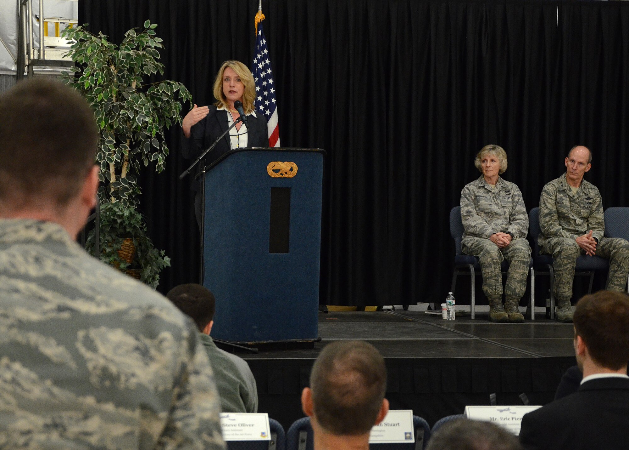 PEASE AIR NATIONAL GUARD BASE, N.H. -- Secretary of the Air Force Deborah Lee James answers a question from a member of the 157th Air Refueling Wing during an all-call in Building 256 here, May 2 as N.H. Air National Guard Command Carolyn Protzmann (left) and Maj. Gen. William N. Reddel, The Adjutant General N.H. National Guard, look on. During her visit, James met with senior leaders from the N.H. Air National Guard and the 157 ARW to discuss Total Force Integration, the State Partnership Program and Chemical, Biological, Radiological, Nuclear and High-Yield Explosive Enhanced Response Force Package (CERFP) mission. In addition, she received a windshield tour of the base as well as meet with members of the 157th Maintenance Group and the N.H. Sexual Assault Prevention Response team. (U.S. Air Force Photo by Tech. Sgt. Mark Wyatt/RELEASED)