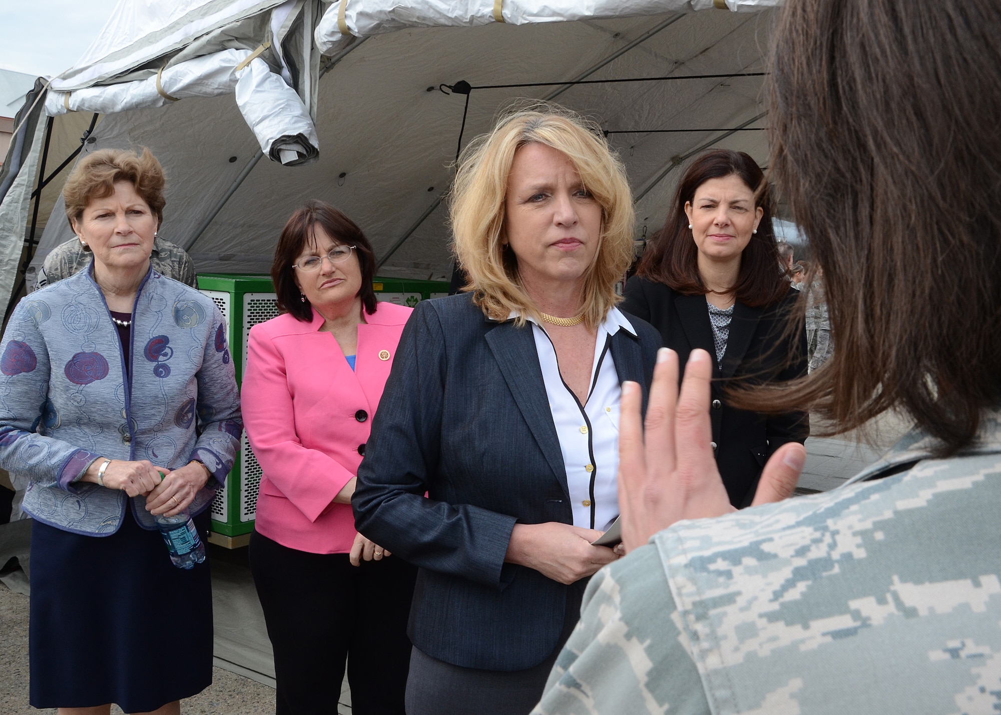 PEASE AIR NATIONAL GUARD BASE, N.H. -- Secretary of the Air Force Deborah Lee James listens to N.H. Air National Guard Capt. Tori Scearbo, 157th Medical Group nurse, discuss the Chemical, Biological, Radiological, Nuclear and High-Yield Explosive Enhanced Response Force Package, or CERFP, mission here, May 2 as U.S. Senator Jeanne Shaheen (left), U.S. Representative Annie Kuster (center) and U.S. Senator Kelly Ayotte look on. During her visit, James met with senior leaders from the N.H. Air National Guard and the 157 ARW to discuss Total Force Integration, the State Partnership Program and toured a
KC-135 aircraft. In addition, she received a windshield tour of the base, held an all-call with Airmen, and met with members of the 157th Maintenance Group and the N.H. Sexual Assault Prevention Response team. (U.S. Air Force Photo by Tech. Sgt. Mark Wyatt/RELEASED)
