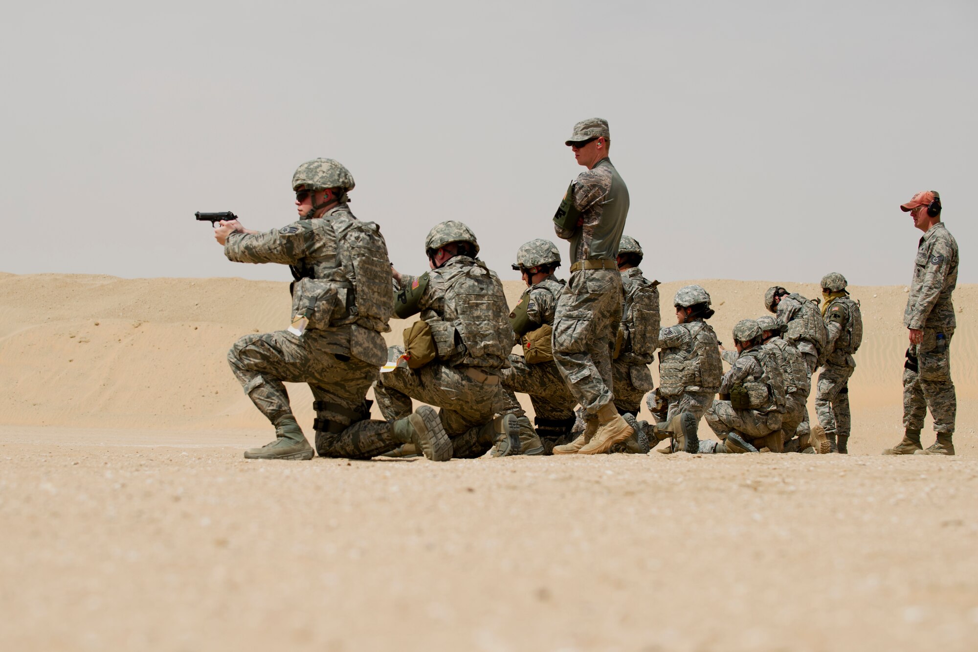 Members of the 387th ESPTS Force Protection received weapons proficiency training with combat arms instructors from the 387th Expeditionary Security Forces Squadron while deployed to the AOR.  Because Force Protection Airmen act as augmentees to security forces, it is important that they receive on-going proficiency training to ensure they are ready to properly react and respond during times of increased threats.  (U.S. Air Force photo by Senior Master Sgt. Burke Baker)