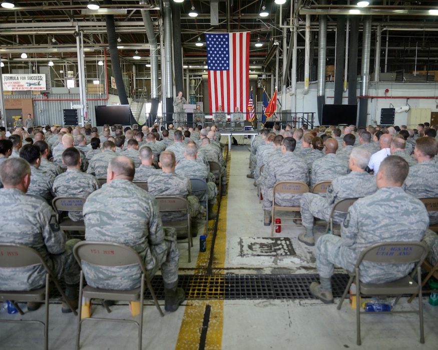 Utah Air National Guard State Command Chief, CMSgt Michael Edwards reiterates the message of safety and looking out for one another during the morning message from the leadership that kicked off Wingman Day.  The Utah Air National Guard holds Wingman Day in order to provide some time to their Airmen to strengthen themselves; physically, mentally, emotionally and socially. (Utah Air National Guard photo by TSgt Kelly Collett/Released 2014)