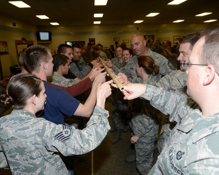 Airmen from the Utah National Guard, located at the Salt Lake City Airbase, take time on Wingman Day to participate in a team-building exercise.  Wingman Day is held annually for the UTANG Airmen to strengthen themselves physically, mentally, socially and spiritually. (Utah Air National Guard photo by TSgt Kelly Collett/Released 2014)