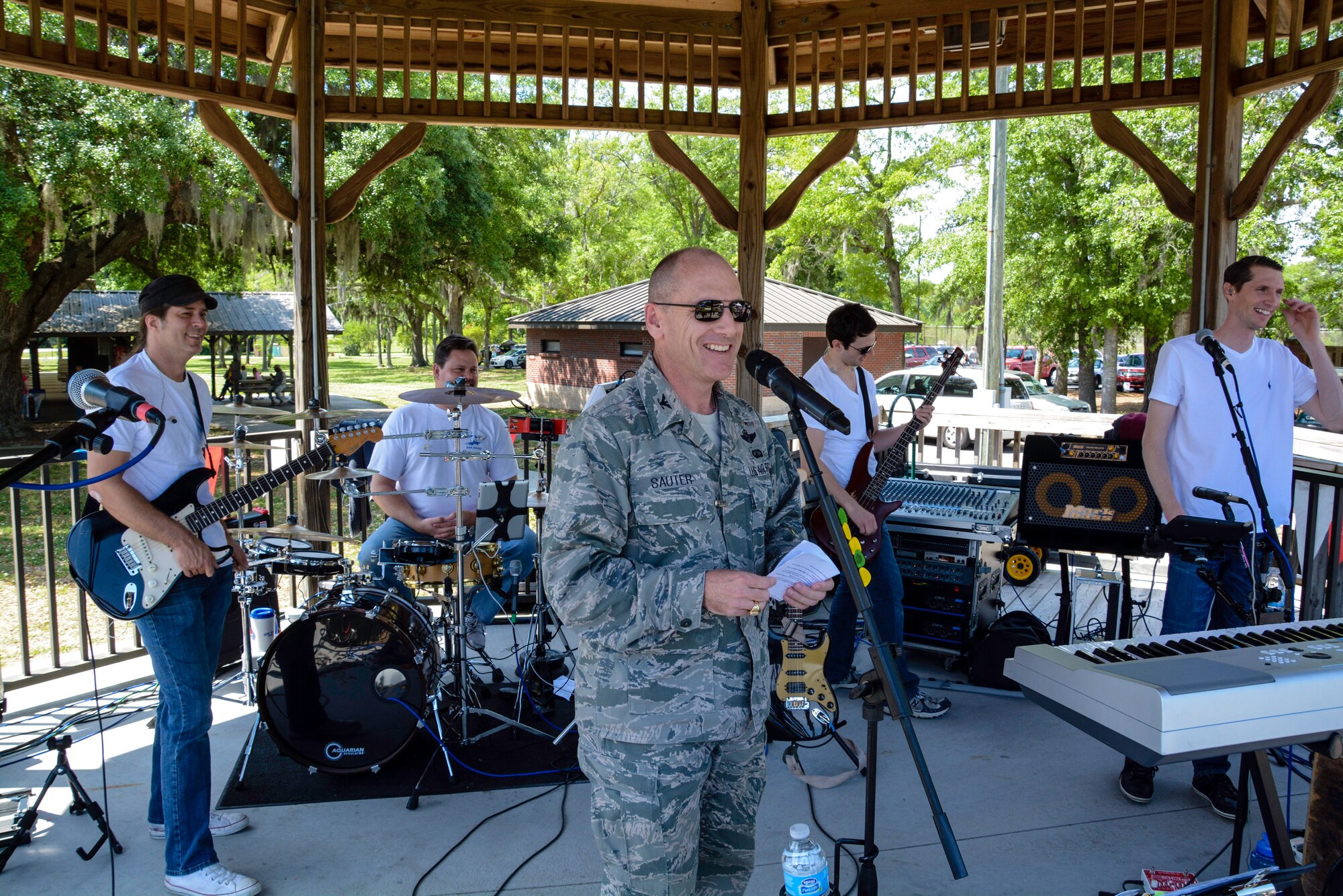Col. Scott Sauter, 315th Airlift Wing commander, gives opening remarks during the annual Joint Base Charleston Appreciation Picnic May 3, 2014 at the Air Base picnic grounds. The picnic had a wide-range of activities available to both adults and children, including a jousting station, inflatable water slide, corn hole tournament, and a mini C-17 static display. More than 2,000 people attended the picnic this year. (U.S. Air Force photo/Tech. Sgt. Shane Ellis)