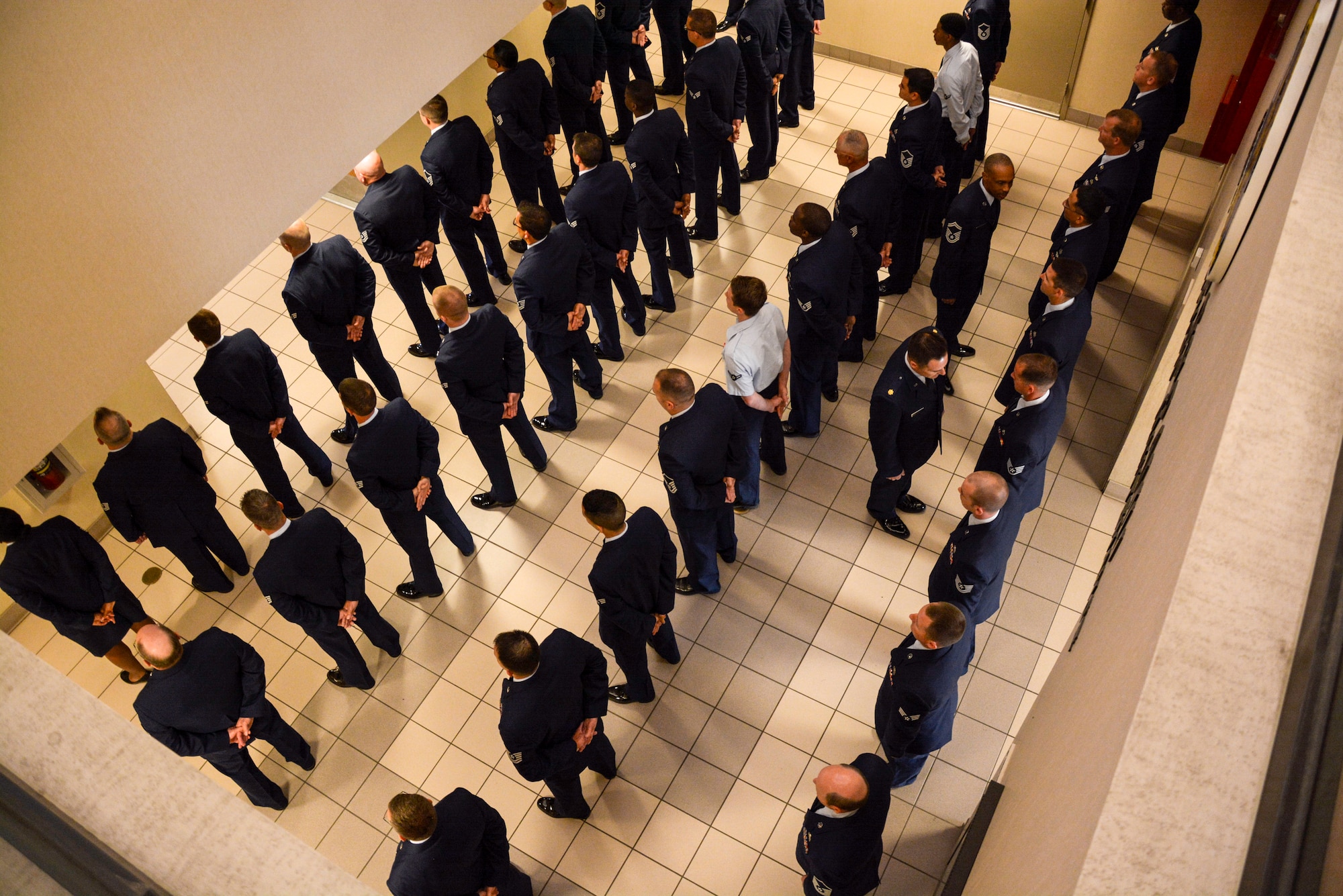Leadership from the 315th Aircraft Maintenance Squadron perform an open ranks inspection May 4, 2014 at Joint Base Charleston, S.C. Open ranks inspections are conducted periodically in order to ensure Airmen maintain professional dress and appearance standards. These U.S. military inspections date back to the late 1700s, during the time of General George Washington, when drill regulations were introduced to citizen soldiers of revolutionary forces. (U.S. Air Force photo/Tech Sgt Shane Ellis)