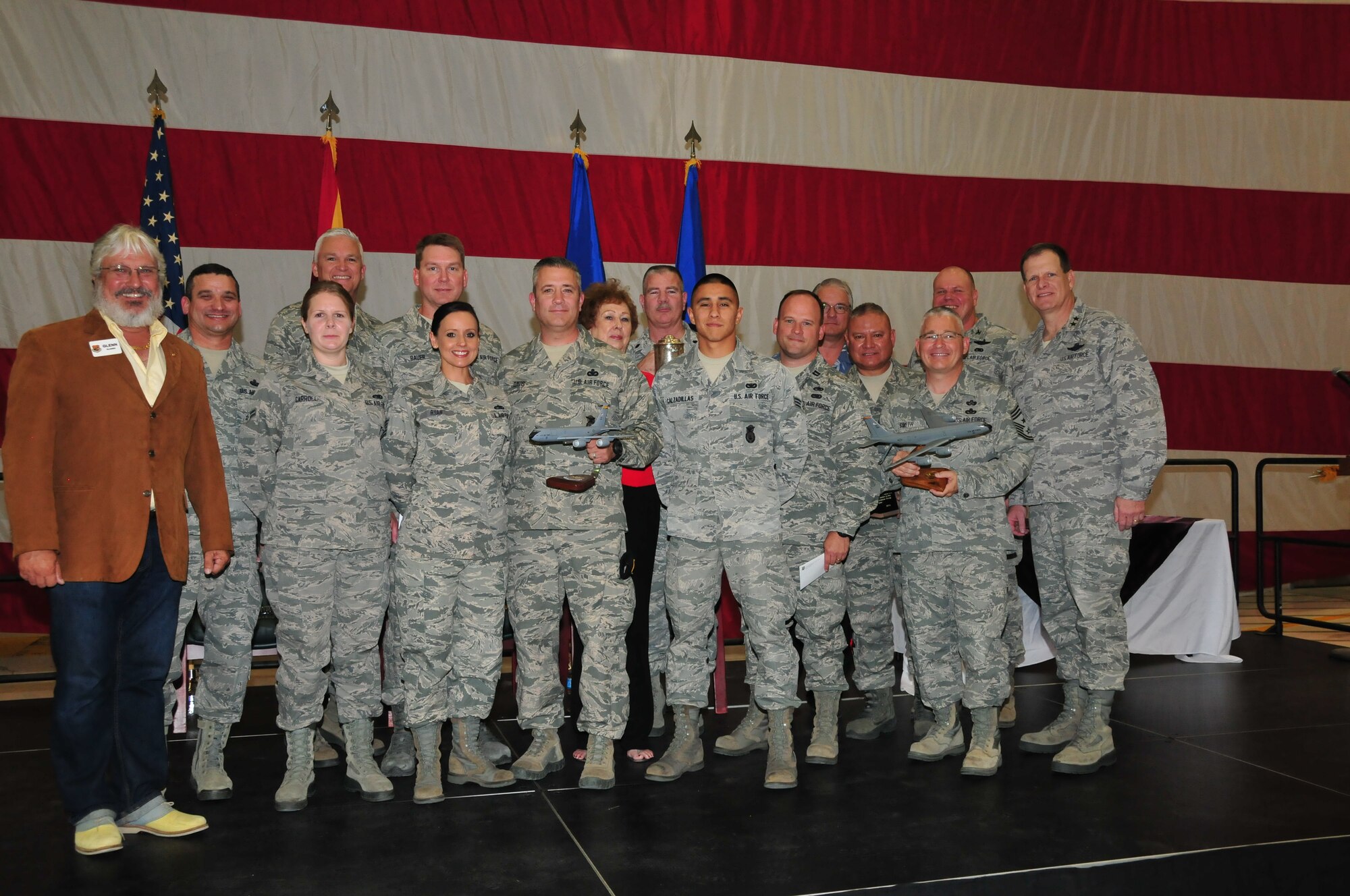 Airmen are recognized during a wing wide ceremony at the 161st Air Refueling Wing, Phoenix, May 3, 2014. The ceremony recognized the 161 ARW’s Outstanding Airmen of the Year, Air National Guard Flight Crew Flight Equipment competition winner, recipients of the federal Meritorious Service Medal, Associate Degree recipients from the Community College of the Air Force and a recipient of the Air Medal. In addition, the Albert Leo Burns Trophy, the Hugh P. Kelly Memorial Award and the Copper 5 Award were awarded. (U.S. Air National Guard Photo by Staff Sgt. Courtney Enos/Released)