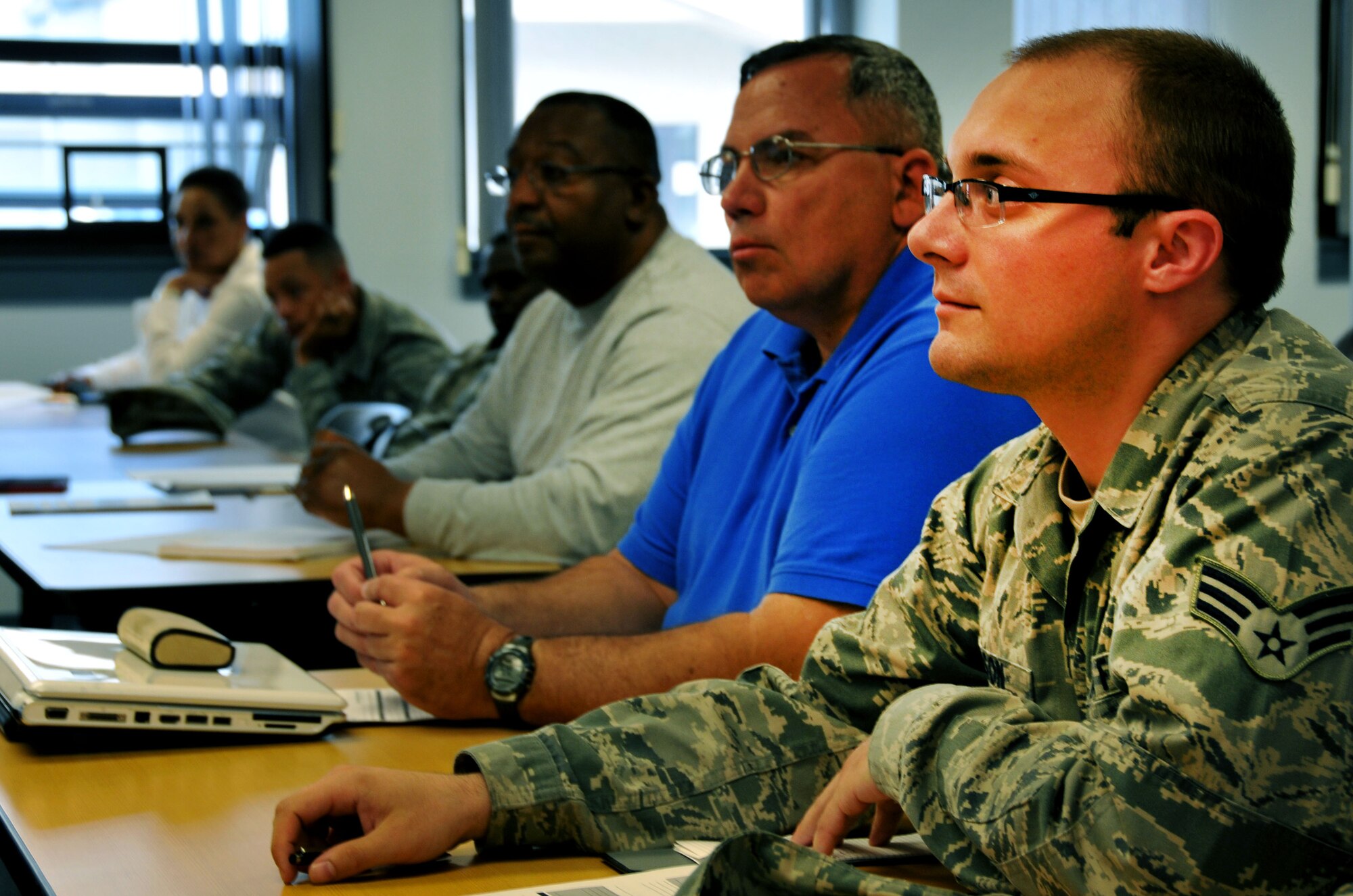 Senior Airman Nicholas Carson, 712th Aircraft Maintenance crew chief, asks questions during a resume class sponsored by the 512th Airlift Wing Airman & Family Readiness office May 3, 2014 on Dover Air Force Base, Del. Carson said he attended the class to learn skills that will help in improving his current resume. (U.S. Air Force photo/Tech. Sgt. Andria J. Allmond)
