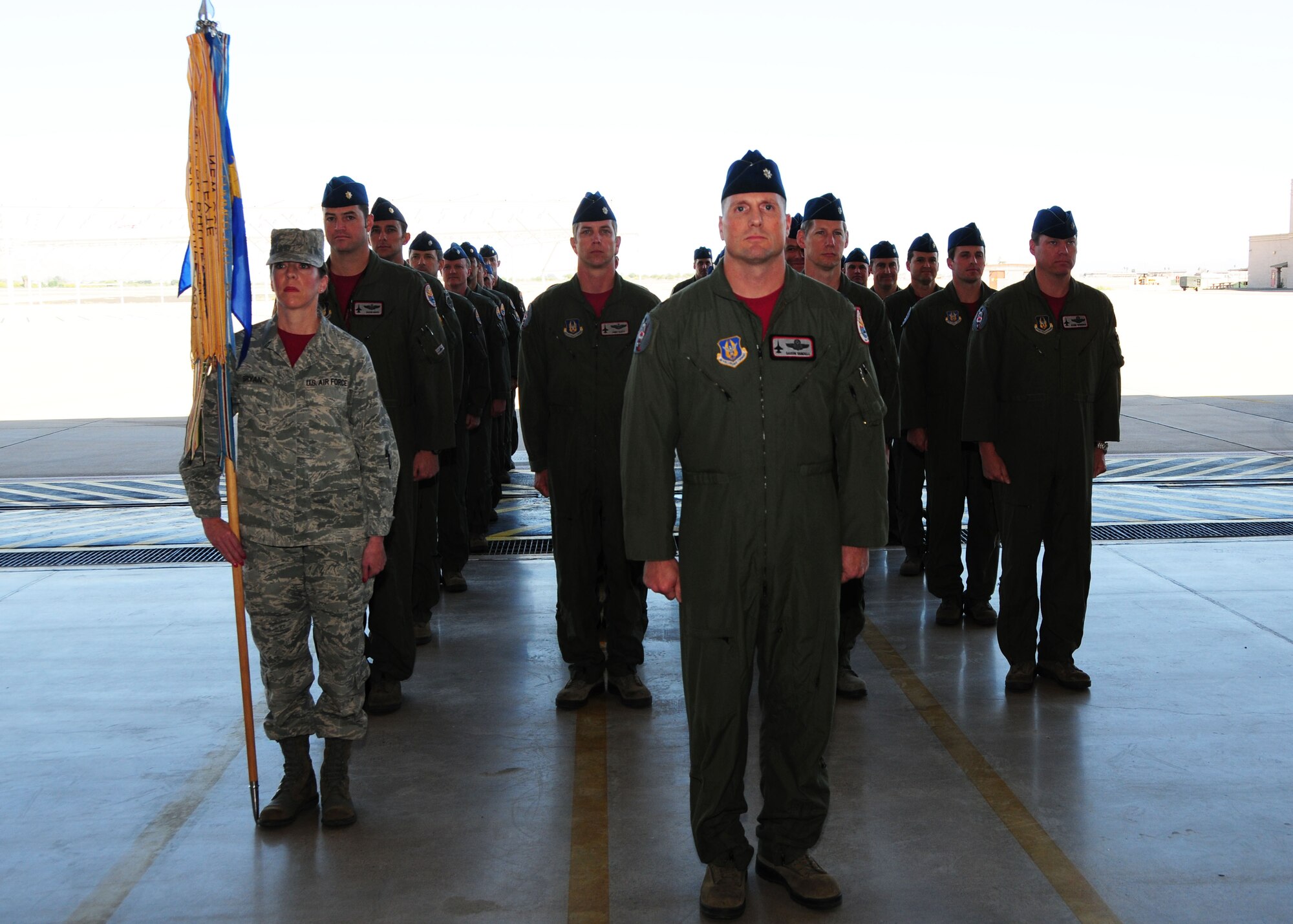 69th Fighter Squadron personnel stand at attention during the Change of Command ceremony May 2. Lt. Col. Korey Amundson assumed command from Lt. Col. Gerald Brown during the morning ceremony. (U.S. Air Force photo/Tech Sgt. Louis Vega Jr.)