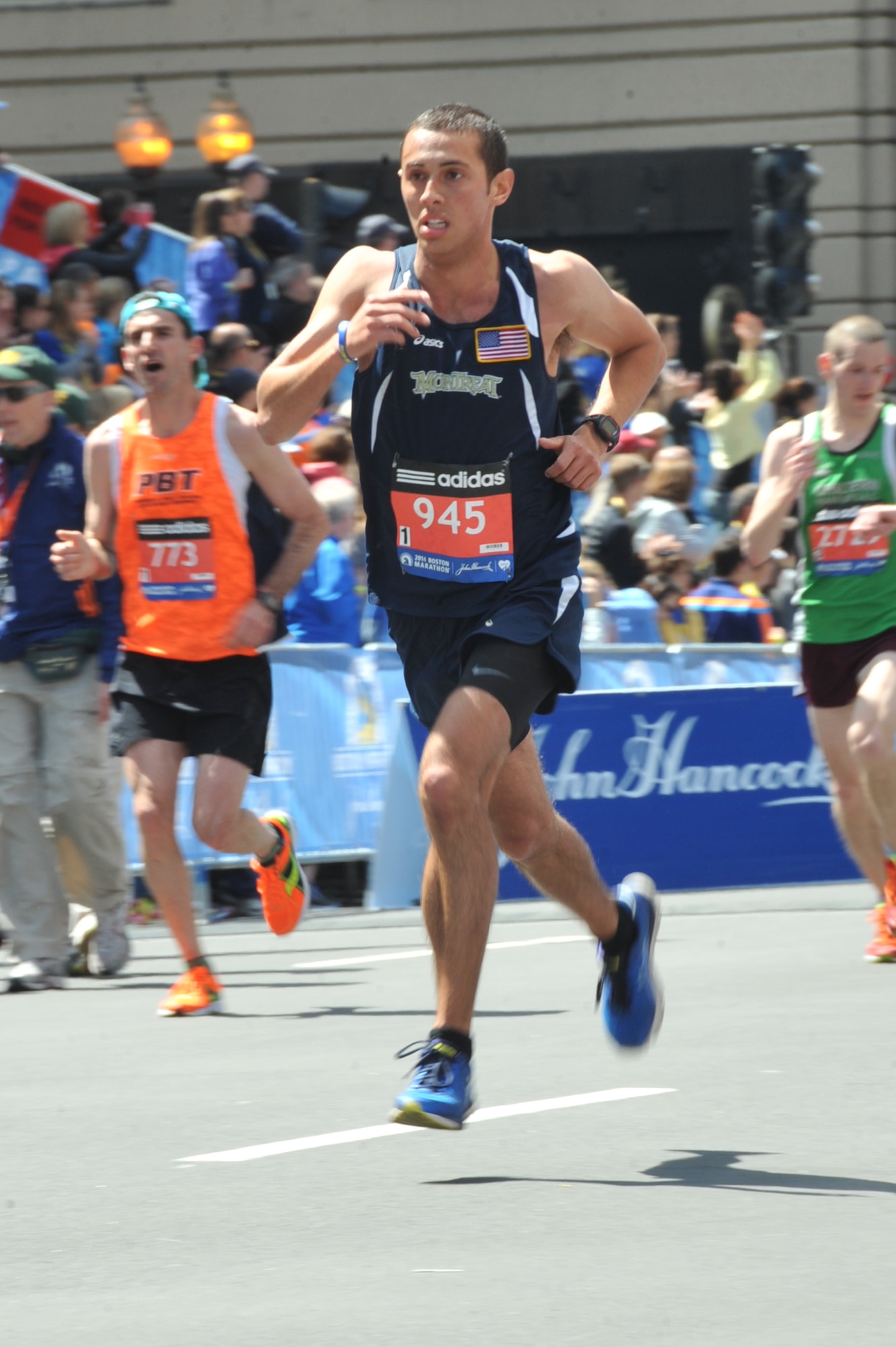 BOSTON, MASS. - Senior Airmen Winston Rheinbolt (center), 440th Aircraft Maintenance Squadron, Pope Field, N.C., competed in the Boston Marathon, April 21.  The reservist and crew chief finished the 26.2 mile race with a time of 2 hours, 44 minutes, 34 seconds.  A determined and dedicated athlete, Rheinbolt said he hopes to make it to the 2014 Air Force Marathon at Wright Patterson Air Force Base, Ohio, scheduled September 20. (Courtesy photo)