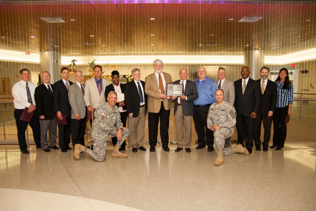 The Norfolk District's Fort Belvoir Community Hospital Project Delivery Team receives the U.S. Army Corps of Engineers' PDT of the year award for 2013. The team overcame tremendous hurdles as they oversaw construction of a more than $1 billion hospital during the Base Realignment and Closure 2005 process. (U.S. Army photo/Patrick Bloodgood)

