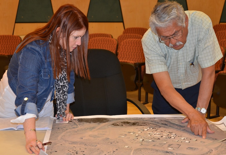 SANTA ANA PUEBLO, -- Lisa Morales, senior USACE tribal liaison, and Governor George Montoya, Pueblo of Santa Ana, discuss Tamaya Village, one of the Corps' ongoing projects with the pueblo.
