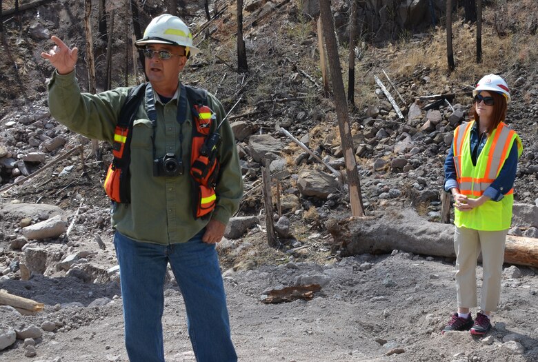 SANTA CLARA PUEBLO, -- Matt Tafoya, tribal forester, Santa Clara Pueblo, explains some of the devastating fire and flood impacts on their native tribal lands to Ms. Morales.