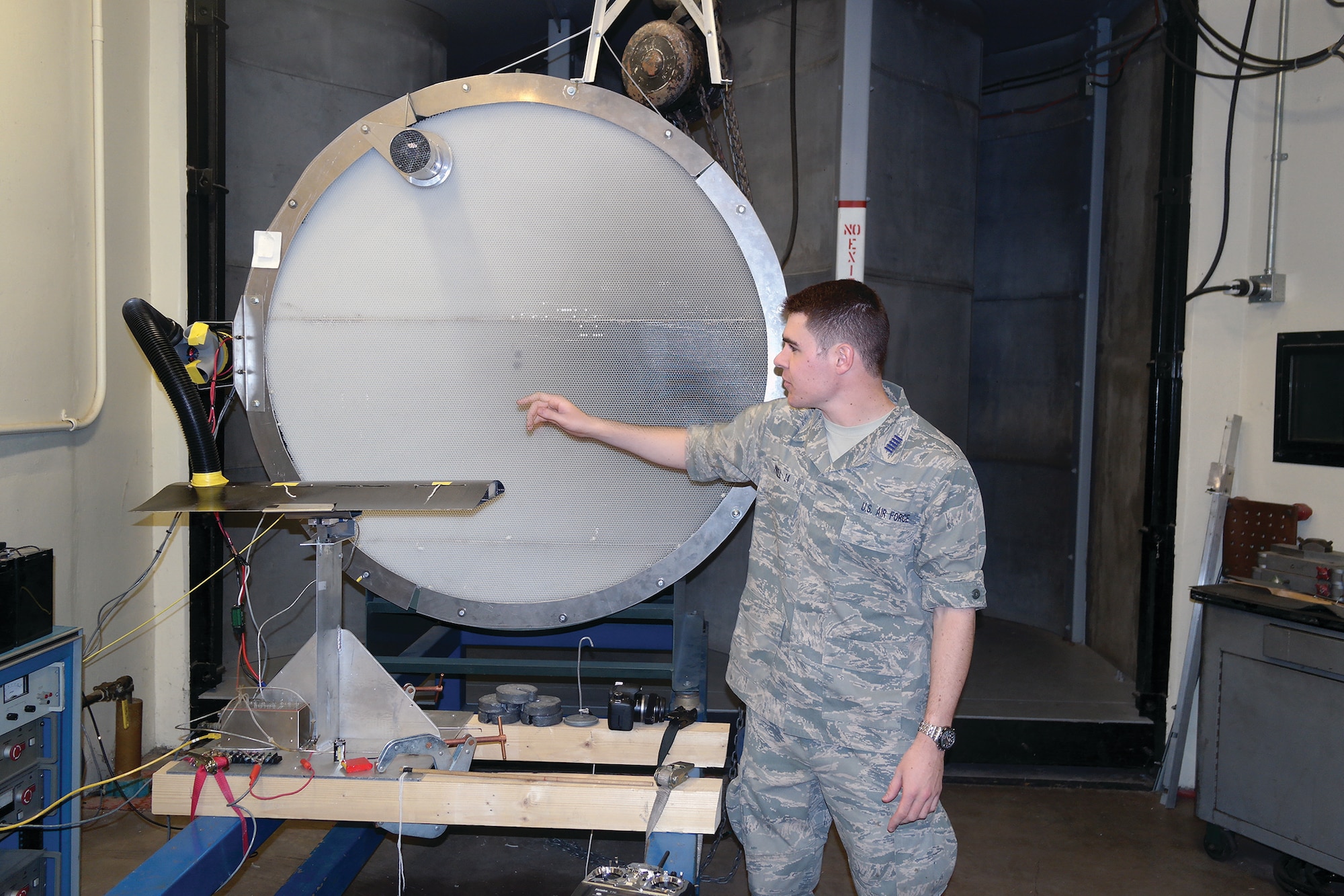 Cadet 1st Class Stefan Morell tests the distributed propulsion engine in the aeronautics laboratory here. The engine won first place in the Defense Advanced Research Project’s innovation competition for the service academies. (U.S. Air Force Photo/Sam Lee)