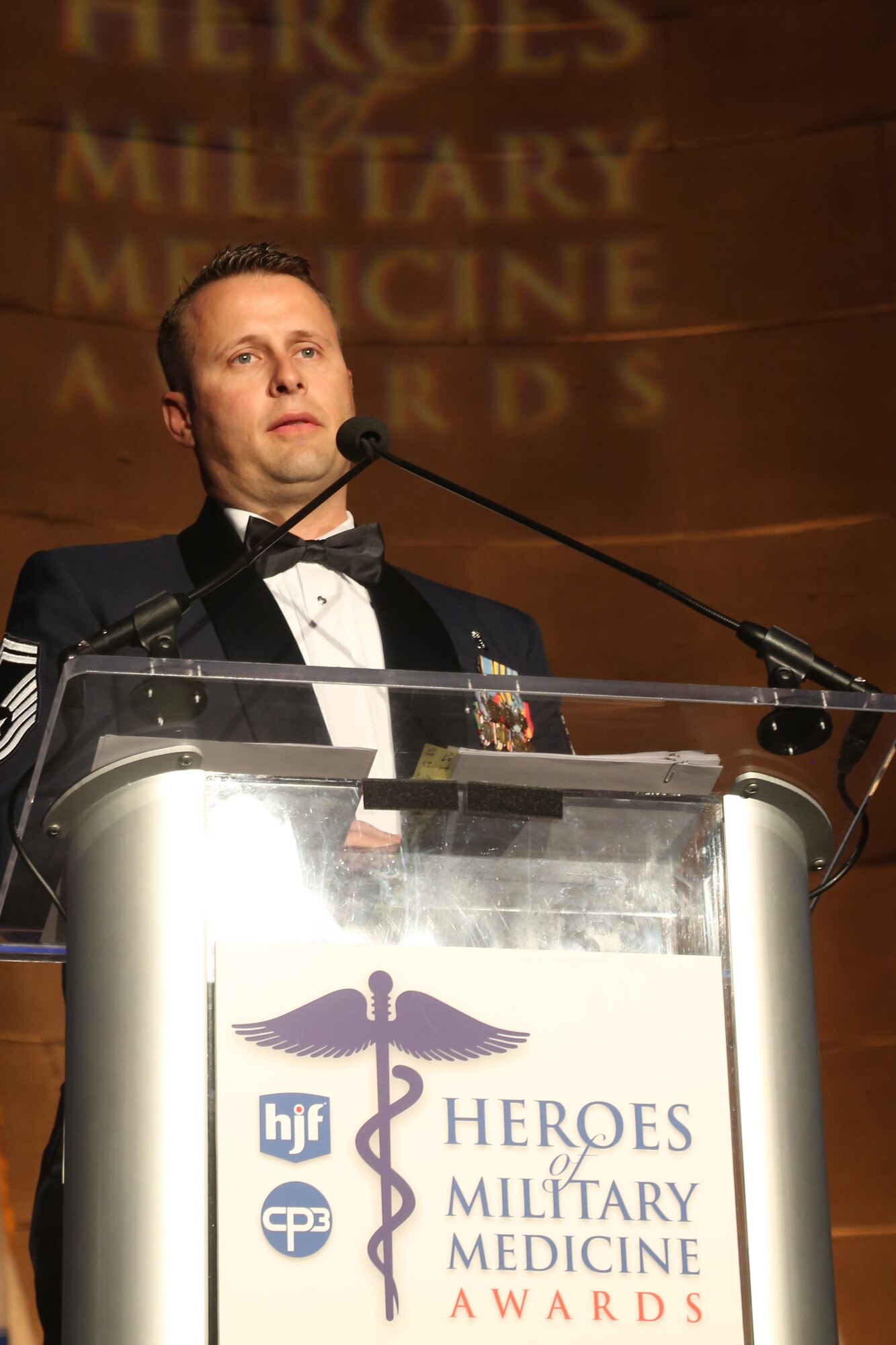Senior Master Sgt. David Smith, 22nd Force Support Squadron career advisor, gives an acceptance speech after receiving the 2014 Heroes of Military Medicine award, May 1, 2014, Washington, D.C. Smith was recognized for helping revise the Advanced Medic Course lectures, lab procedures, and patient simulation scenarios which prepared more than 300 special operations medics. (courtesy photo) 


