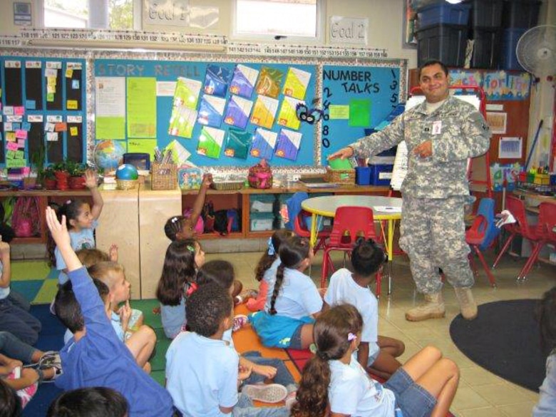 Capt. J.C. Cordon, deputy commander for the Antilles, was impressed by the questions asked by first grade students when he and fellow team members participated in an April 10 Science, Technology, Engineering and Math(STEM) event at the Antilles Elementary School, Fort Buchanan, Puerto Rico.