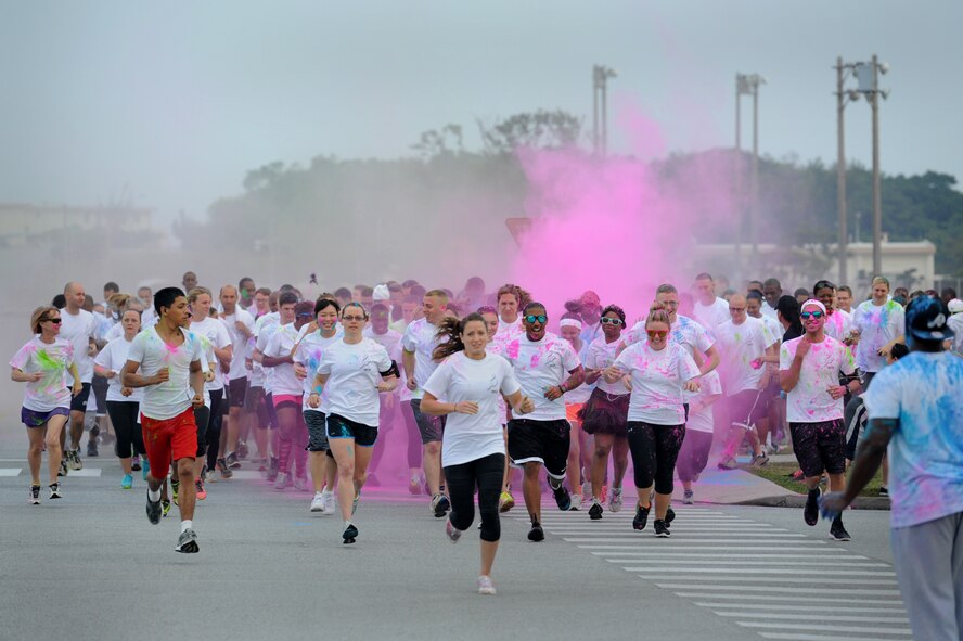 Runners participated in a color run to support Sexual Assault Awareness month on  Kadena Air Base, Okinawa, Japan, April 30, 2014. This event was in support of not only Sexual Assault Awareness Month  but also Alcohol Awareness Month  and National Child Abuse Prevention Month.    (U.S. Air Force photo by Airman 1st Class Zackary A. Henry)