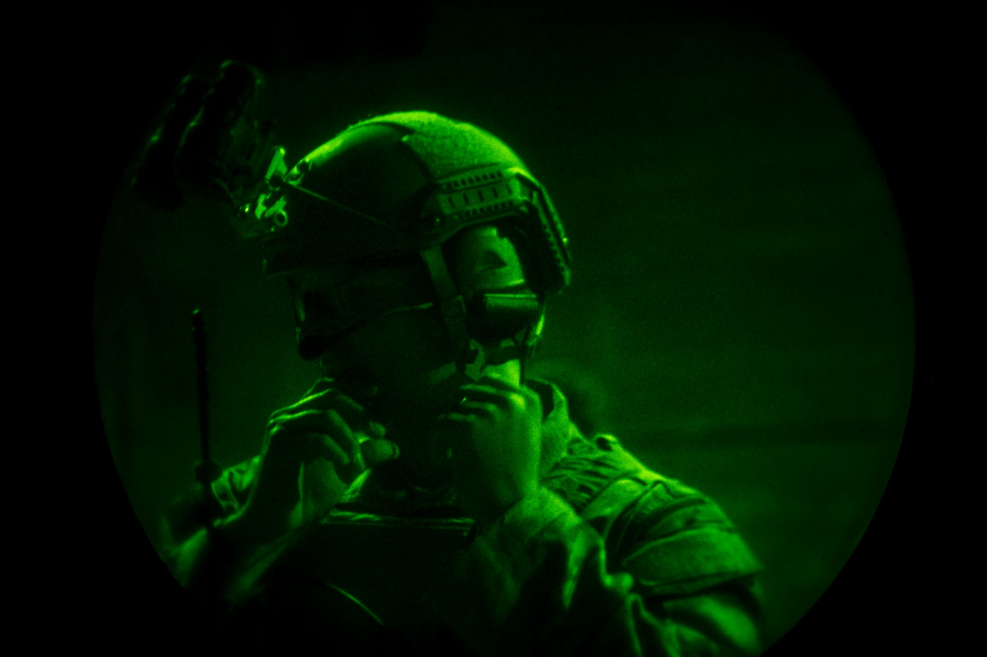 A member of the 20th Special Forces Squadron gets prepared for an urban environment raid during Emerald Warrior 2014, Camp McCain, Miss., May 1, 2014. Emerald Warrior is an annual, joint exercise to train special operations, conventional and partner nation forces in combat scenarios designed to hone special operations air and ground combat skills, and is the Department of Defense's only irregular warfare exercise.  (U.S. Air Force photo by Senior Airman Jodi Martinez)