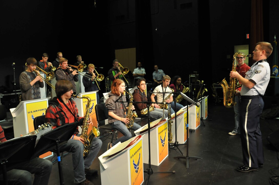 Senior Airman Isaac Lamar plays along with a group of Spokane, WA area jazz band students during a master class in January, 2013.