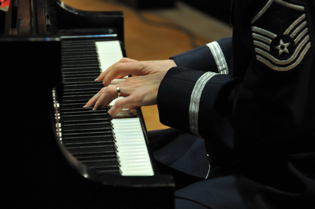 Master Sergeant Mike Williams plays piano with The Commanders jazz ensemble in Spokane, WA. January, 2013.