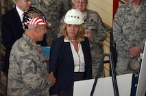 Secretary of the Air Force Deborah Lee James reviews boards reflecting
impact, timelines and the overall mission success of Westover's Regional
Isochronal Dock's (RISO) with SMSgt. Patrick Connor, 439th Maintenance
Squadron Flight Supervisor. SMSgt. Connor gave James a tour of the C-5
Galaxy as well as the RISO during her visit to Westover on May 2. (U.S. Air Force photo/SSgt. Kelly Goonan)