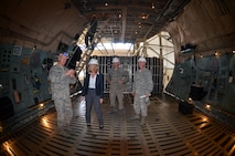 SMSgt. Patrick Connor, 439th Maintenance Squadron Flight Supervisor, shows
Secretary of the Air Force Deborah Lee James the cargo compartment of the
C-5 Galaxy and explains how the C-5 is able to load and unload large amounts
of transported items. SMSgt. Connor gave James a tour of the C-5 Galaxy
during her visit to Westover on May 2. (U.S. Air Force photo/SSgt. Kelly Goonan)