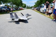 A model plane showcases its jet engine for an audience during Duke Field’s Family Day event May 3.  The 919th Special Operations Wing sets aside a special day each year to show appreciation for its reservists and their family members. Events included music, sports, children’s games, etc. (U.S. Air Force photo/Tech. Sgt. Jasmin Taylor)