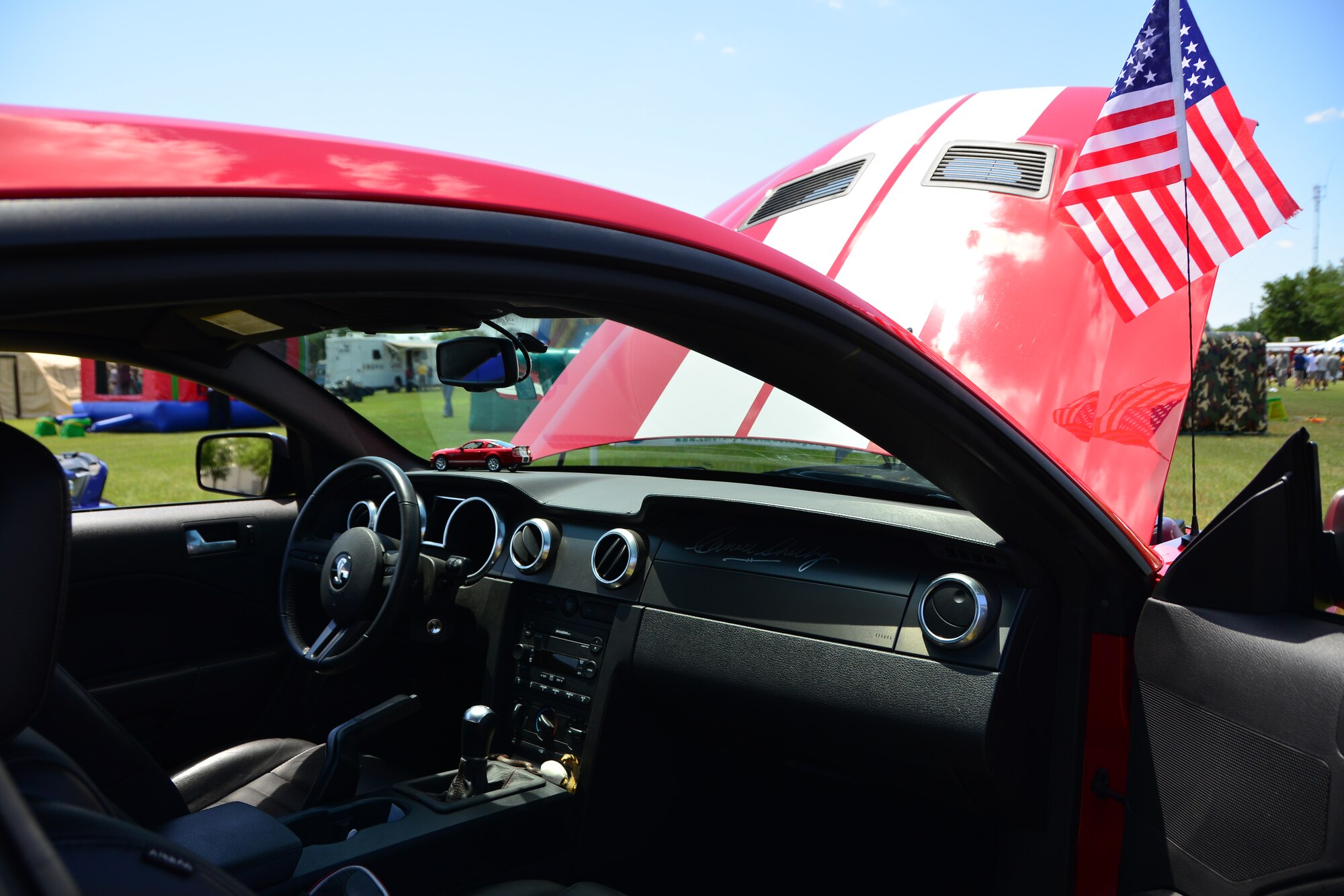 A Shelby mustang is being displayed as part of the car show during Duke Field’s Family Day event May 3.  The 919th Special Operations Wing sets aside a special day each year to show appreciation for its reservists and their family members. Events included music, sports, children’s games, etc. (U.S. Air Force photo/Tech. Sgt. Jasmin Taylor)