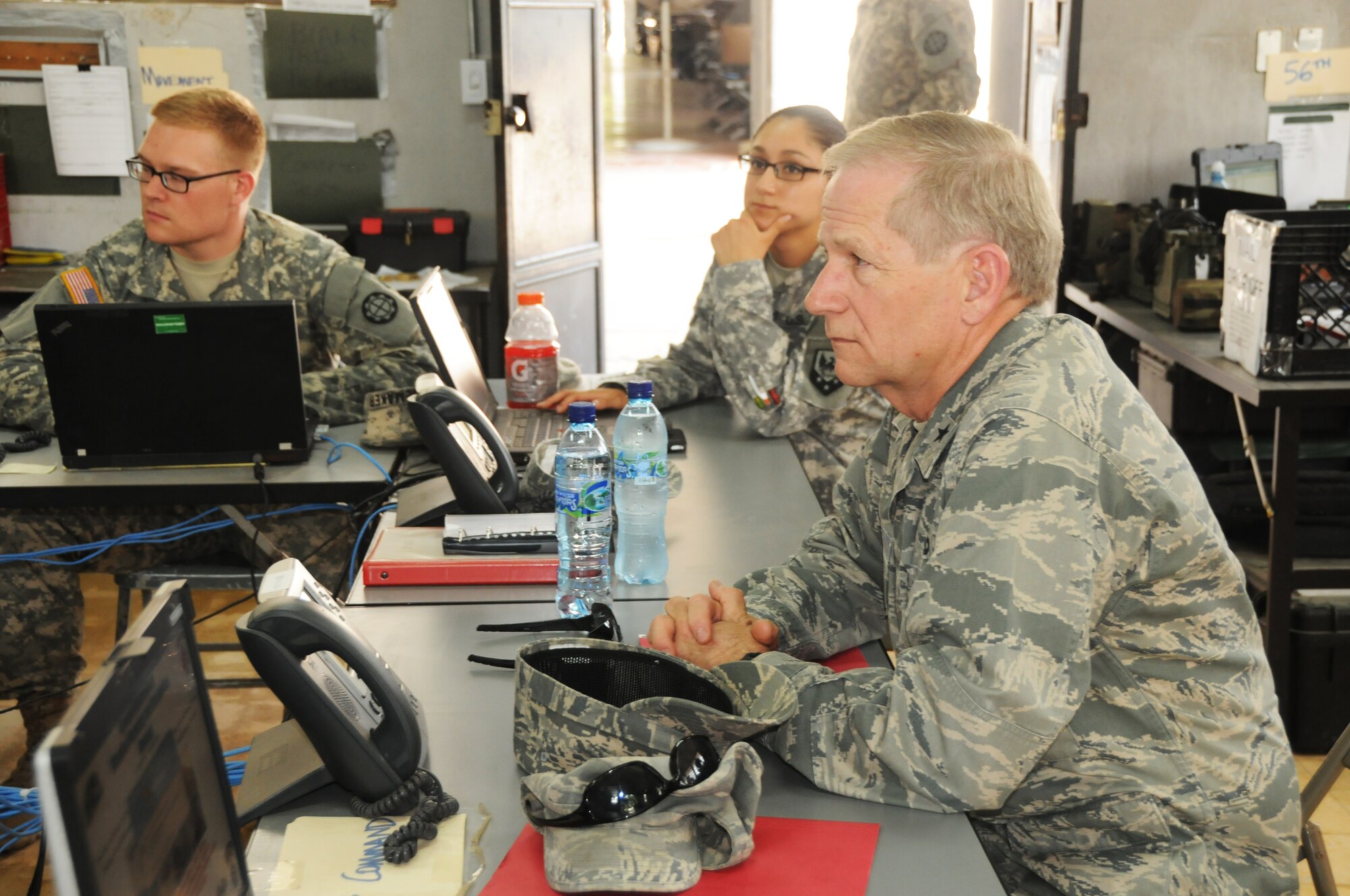 Brig. Gen. Mark Berry, Arkansas Air National Guard chief of staff receives a mission briefing at a Guatemalan Army base in Zacapa April 14. The 188th Civil Engineer Squadron deployed to Guatemala in support of a U.S. Army South-led humanitarian mission called Beyond the Horizon.  The 188th Airmen were there to build a school in the remote town of El Robles, Guatemala. (U.S. Air National Guard photo by Maj. Heath Allen/released)

