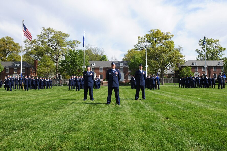 Headquarters Air Mobility Command members stand in formation May 5, 2014 during a change of command ceremony at Scott Air Force Base, Illinois. Air Force Chief of Staff Gen. Mark A. Welsh III officiated the ceremony where Gen. Darren W. McDew assumed command of AMC from Gen. Paul J. Selva. (U.S. Air Force photo/Staff Sgt. Maria Bowman)  
