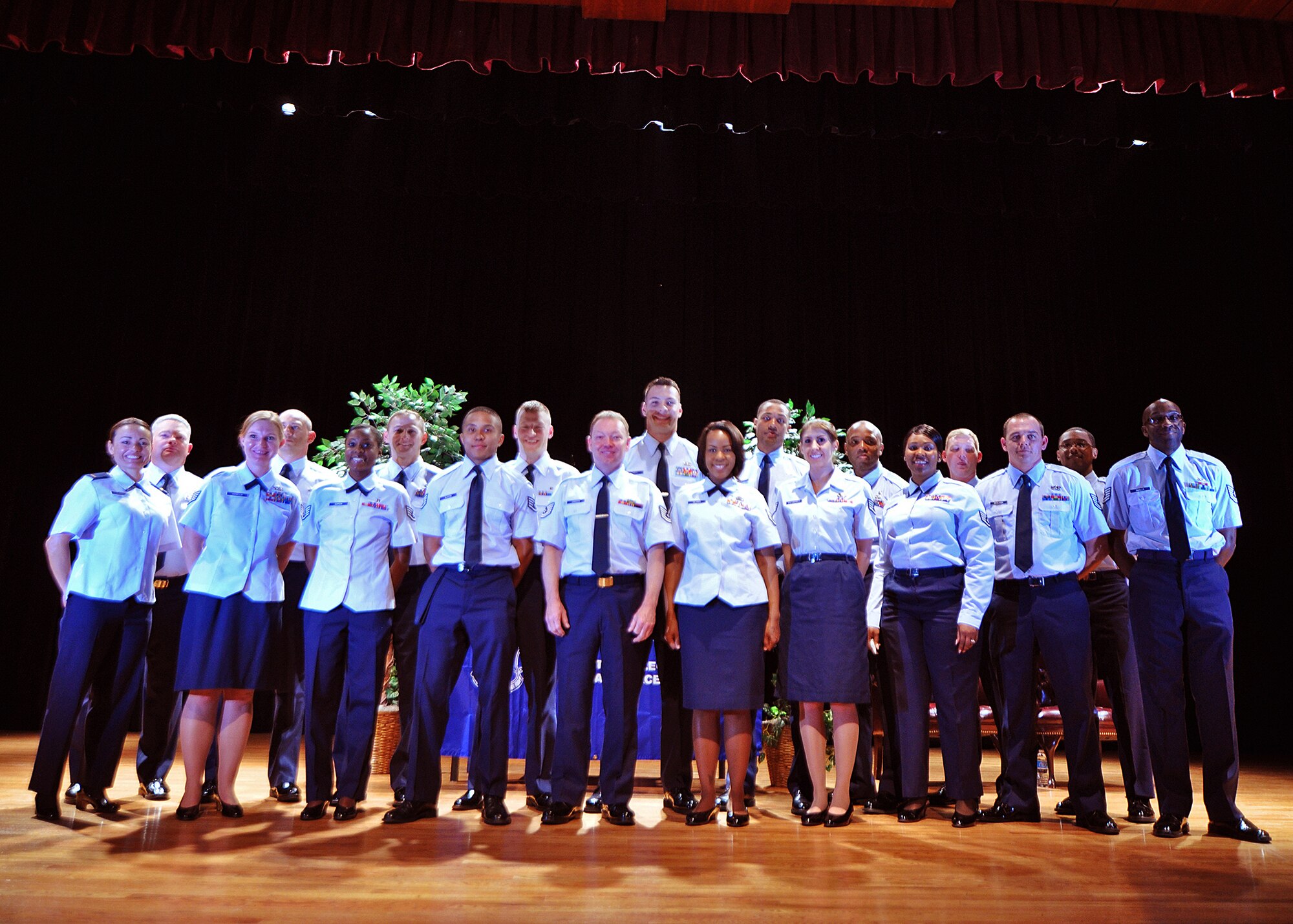 Hundreds of family members and friends gathered at the Air Base Theater May 5, 2014 at Joint Base Charleston, South Carolina to celebrate the academic accomplishments of 64 Community College of the Air Force graduates. (U.S. Photo by Capt. Michaela Judge)

