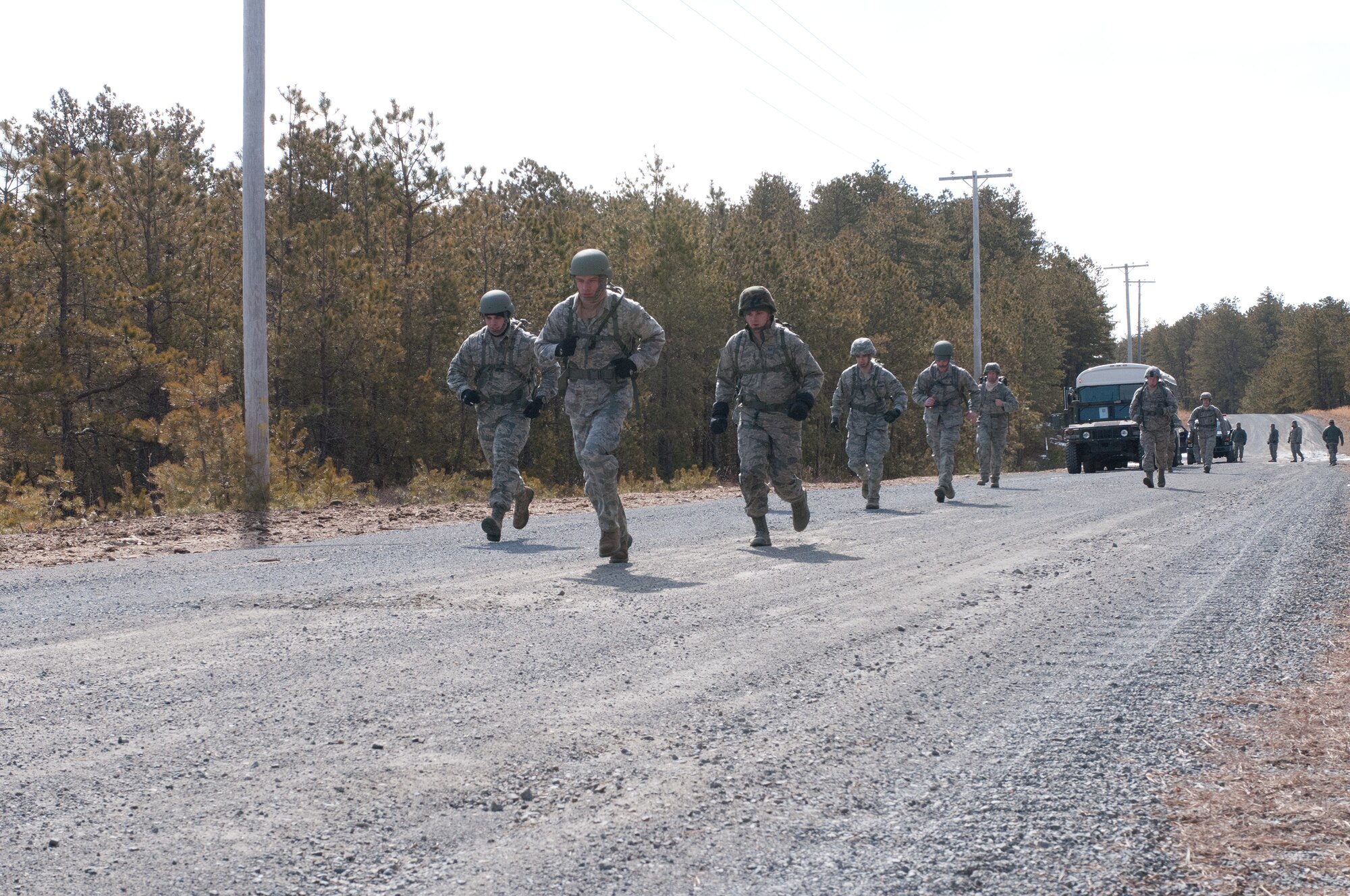 Airmen from the 102nd Intelligence Wing and the 104th Fighter Wing compete in the Best Airman Warrior competition on Joint Base Cape Cod, March 1, 2014. The competition tested Airmen in areas like shooting, land navigation, and physical fitness. (National Guard photo by Staff Sgt. Jeremy Bowcock/Released)