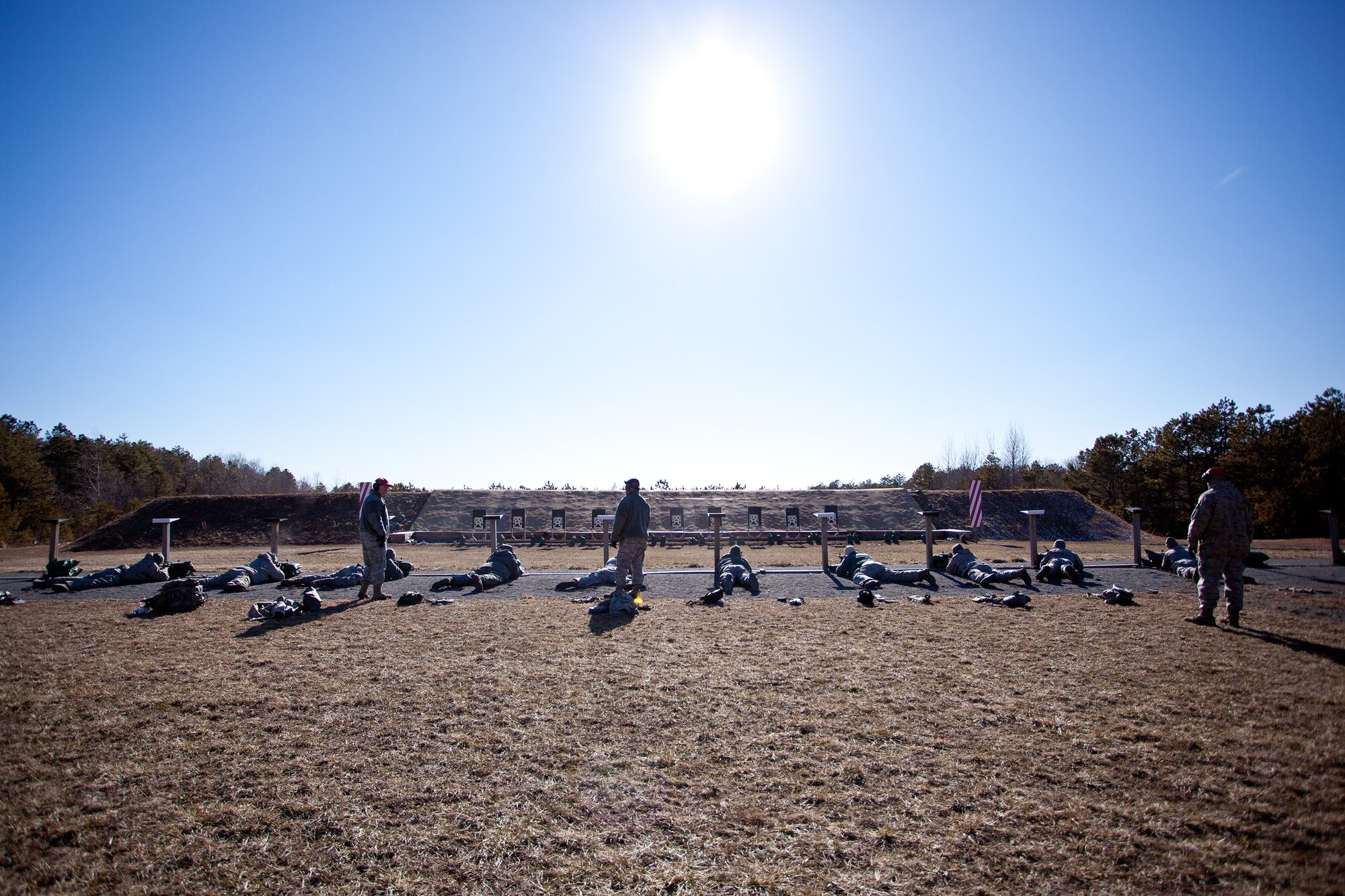 Airmen from the 102nd Intelligence Wing and the 104th Fighter Wing compete in the Best Airman Warrior competition on Joint Base Cape Cod, February 28, 2014. The competition tested Airmen in areas like shooting, land navigation, and physical fitness. (National Guard photo by Staff Sgt. Jeremy Bowcock/Released)