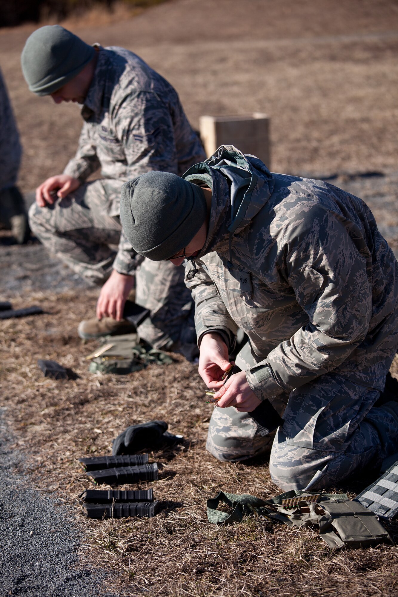 Airmen from the 102nd Intelligence Wing and the 104th Fighter Wing compete in the Best Airman Warrior competition on Joint Base Cape Cod, February 28, 2014. The competition tested Airmen in areas like shooting, land navigation, and physical fitness. (National Guard photo by Staff Sgt. Jeremy Bowcock/Released)