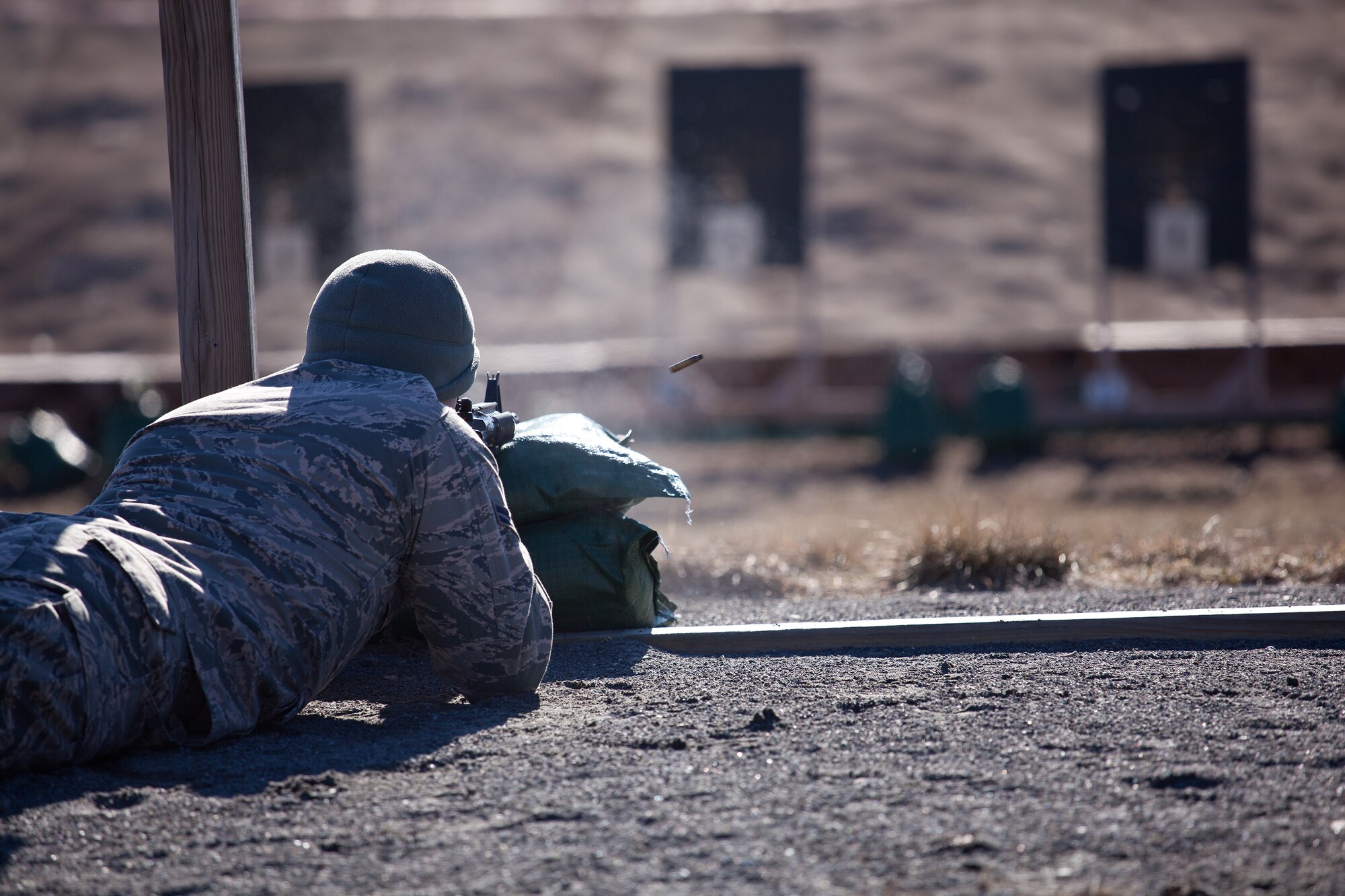 Airmen from the 102nd Intelligence Wing and the 104th Fighter Wing compete in the Best Airman Warrior competition on Joint Base Cape Cod, February 28, 2014. The competition tested Airmen in areas like shooting, land navigation, and physical fitness. (National Guard photo by Staff Sgt. Jeremy Bowcock/Released)
