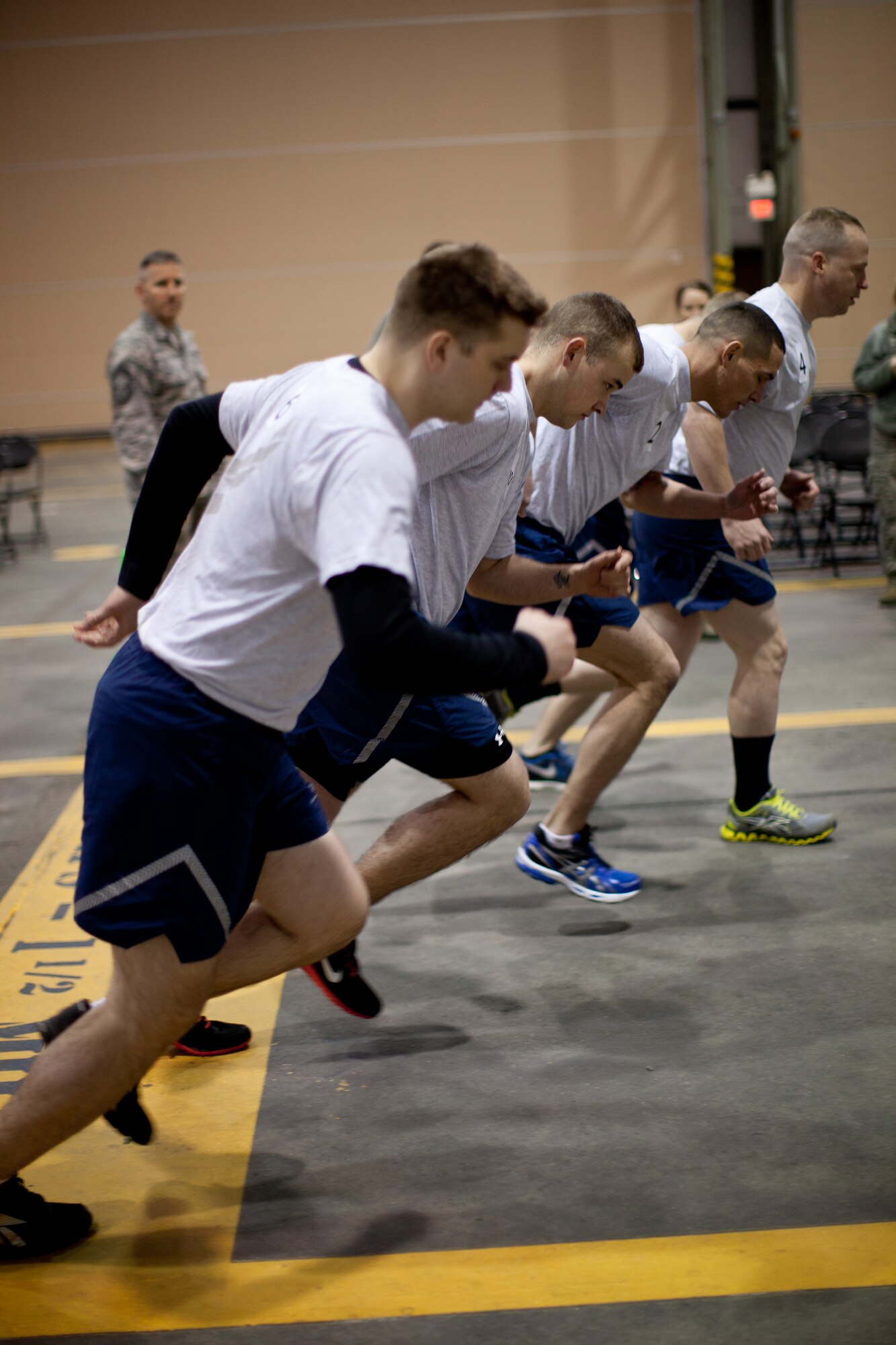 Airmen from the 102nd Intelligence Wing and the 104th Fighter Wing compete in the Best Airman Warrior competition on Otis Air National Guard Base February 28, 2014. The competition tested Airmen in areas like shooting, land navigation, and physical fitness. (National Guard photo by Staff Sgt. Jeremy Bowcock/Released)