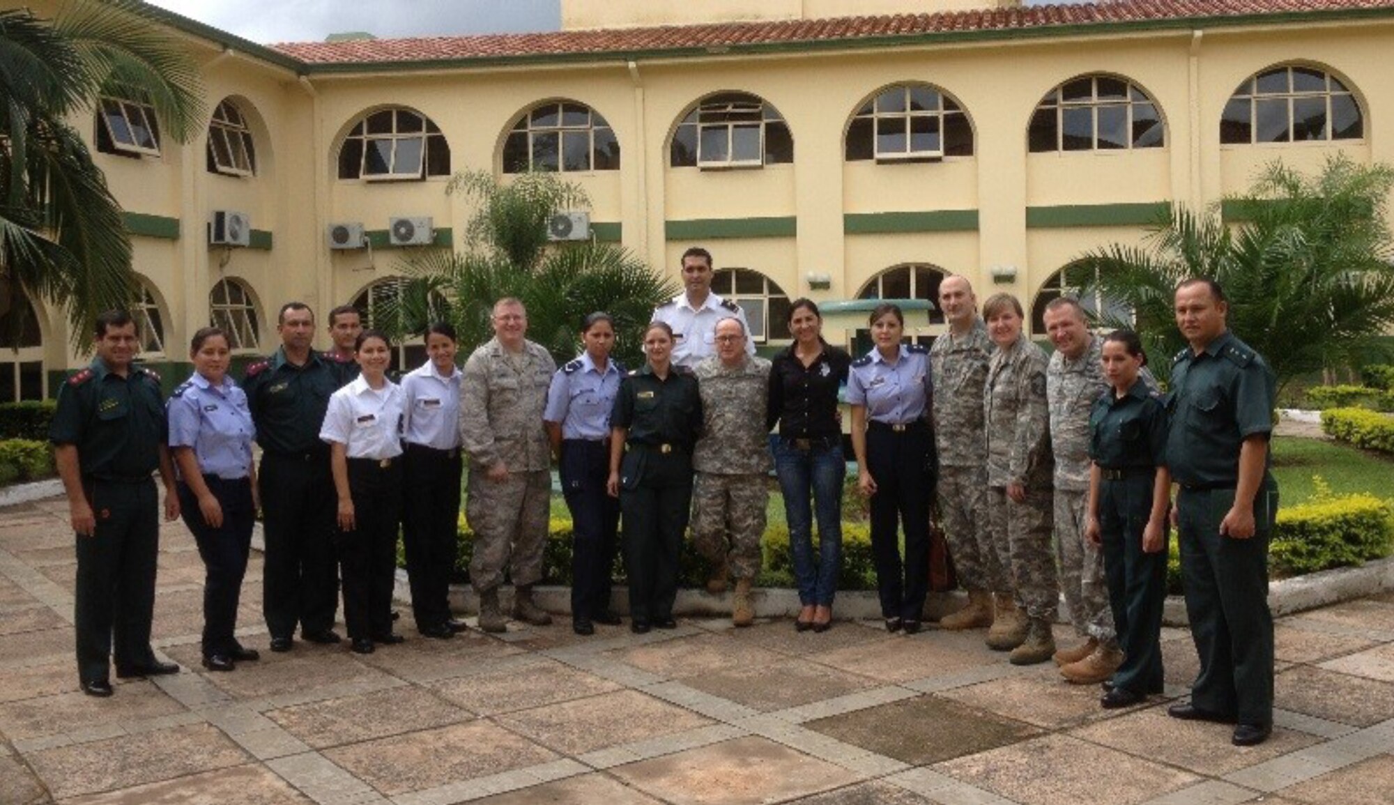 Members of the Massachusetts National Guard post with members of the Paraguayan military during a trip to Paraguay. The soldiers and airmen were there as part of the National Guard's State Parternership Program, which fosters an exchange of ideas and knowledge between a state and its host country.