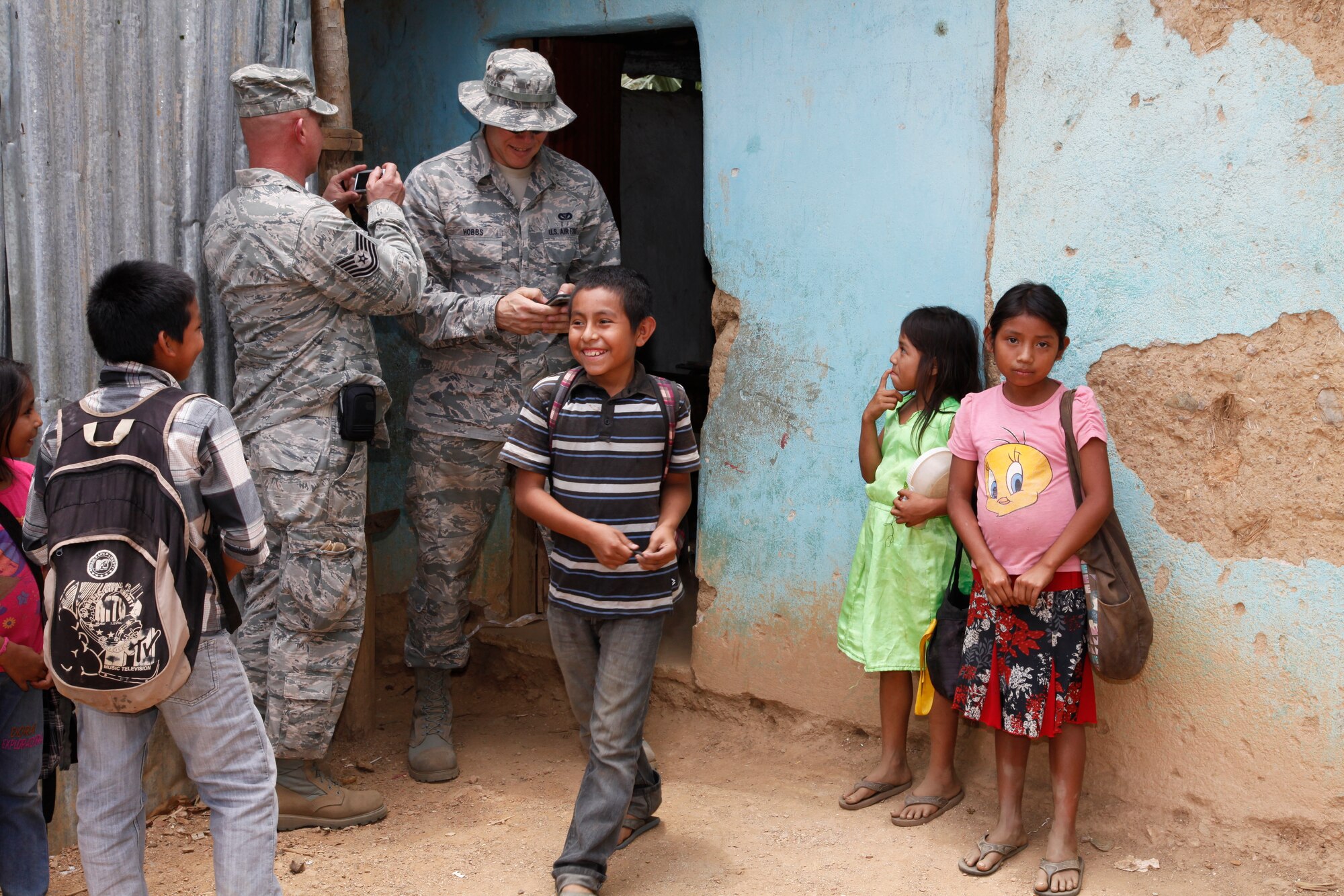 188th Civil Engineer Squadron Airmen tour a school that they replaced with a new building in El Robles, Guatemala, April 7, 2014 during Beyond the Horizons, which is a U.S. partnership with the government of Guatemala conducting various medical, dental and civic actions programs, providing focused humanitarian assistance. (U.S. Army photo by Sgt. 1st Class Marcus J. Quarterman)