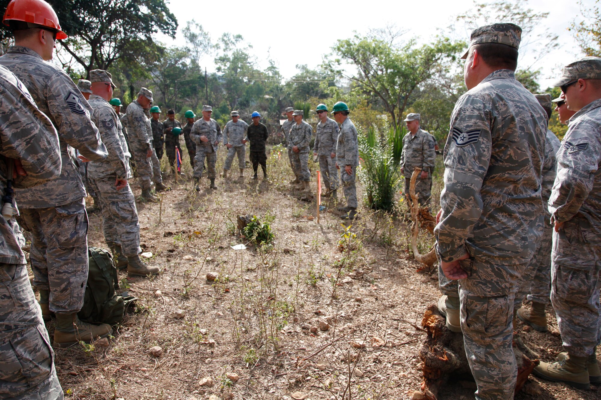Guatemalan, U.S. Army, and 188th Civil Engineer Squadron members have a safety briefing during Beyond the Horizons, prior to beginning work in El Robles, Guatemala April 7, 2014. Beyond the Horizons is a U.S. partnership with the government of Guatemala conducting various medical, dental and civic actions programs, providing focused humanitarian assistance. (U.S. Army photo by Sgt. 1st Class Marcus J. Quarterman)