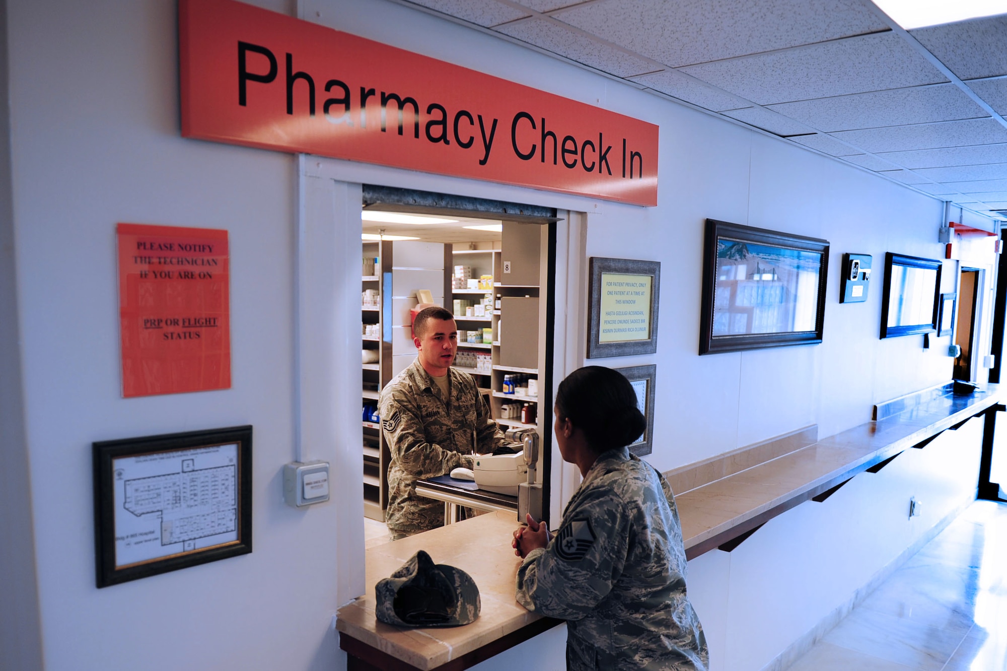 Staff Sgt.  Adam Keegan, 39th Medical Group pharmacy technician, checks in a patient May 5, 2014, Incirlik Air Base, Turkey.  Controlling medications that are dispensed to patients is a top priority at the 39th MDG pharmacy. (U.S. Air Force photo by Senior Airman Nicole Sikorski/Released) 