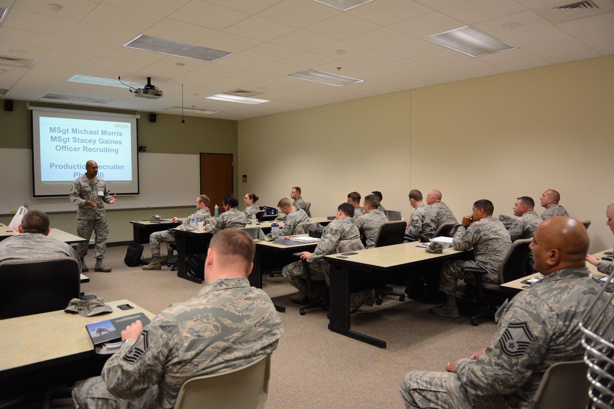 A group of Air National Guard recruiters attend a training class during the 2014 Recruiting and Retention Annual Certification Training Course at Volk Field Air National Guard Base, Wis., April 28, 2014. More than 600 recruiters from across the nation attended the event April 27-May 2. Throughout the week they were divided into smaller groups to receive hands-on training with National Guard Bureau instructors. (Air National Guard photo by Senior Airman Andrea F. Liechti) 