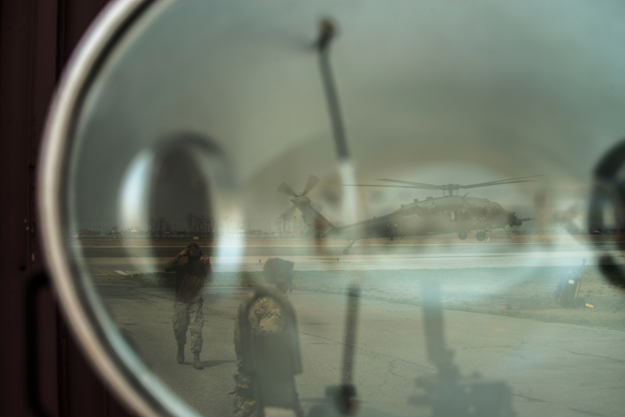 An HH-60 Pave Hawk takes off from the flight line during exercise Pacific Thunder April 18, 2014, at Osan Air Base, Republic of Korea. Maintainers and special forces tested their contingency abilities during the week-long exercise. (U.S. Air Force photo by Staff Sgt. Jake Barreiro)