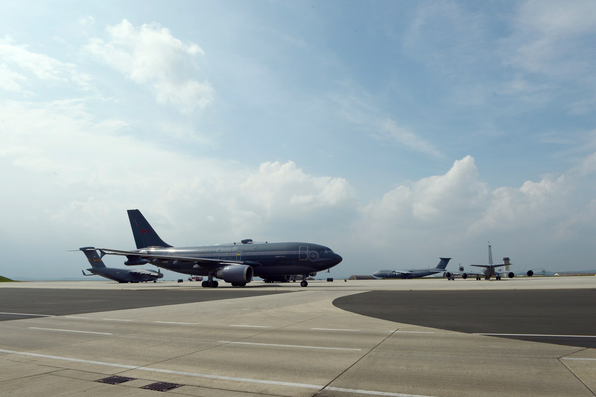 A Royal Canadian Air Force pilot lands a transport aircraft on the flightline May 1, 2014, at Spangdahlem Air Base, Germany.  The Government of Canada is contributing to NATO reassurance measures to promote security and stability in Eastern and Central Europe. The forward-based 52nd Fighter Wing and 726th Air Mobility Squadron here support the NATO partnership with ready forces who enable missions across Europe and Africa.  (U.S. Air Force photo by Staff Sgt. Christopher Ruano/Released