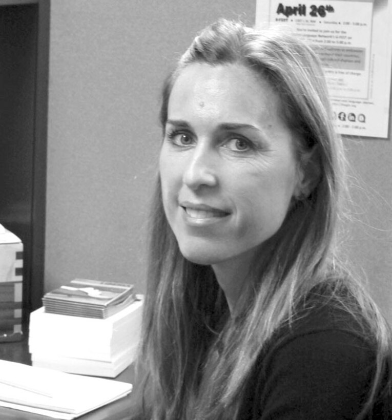 Center for Advanced Operational Cultural Learning Africa desk research analyst Florence Dawson enlisted in the Marine Corps in 2004 after waiting six years to receive her Green Card. Dawson teaches French and other cultural aspects of Africa to Marines and other service members who are preparing to deploy to regions of the continent.