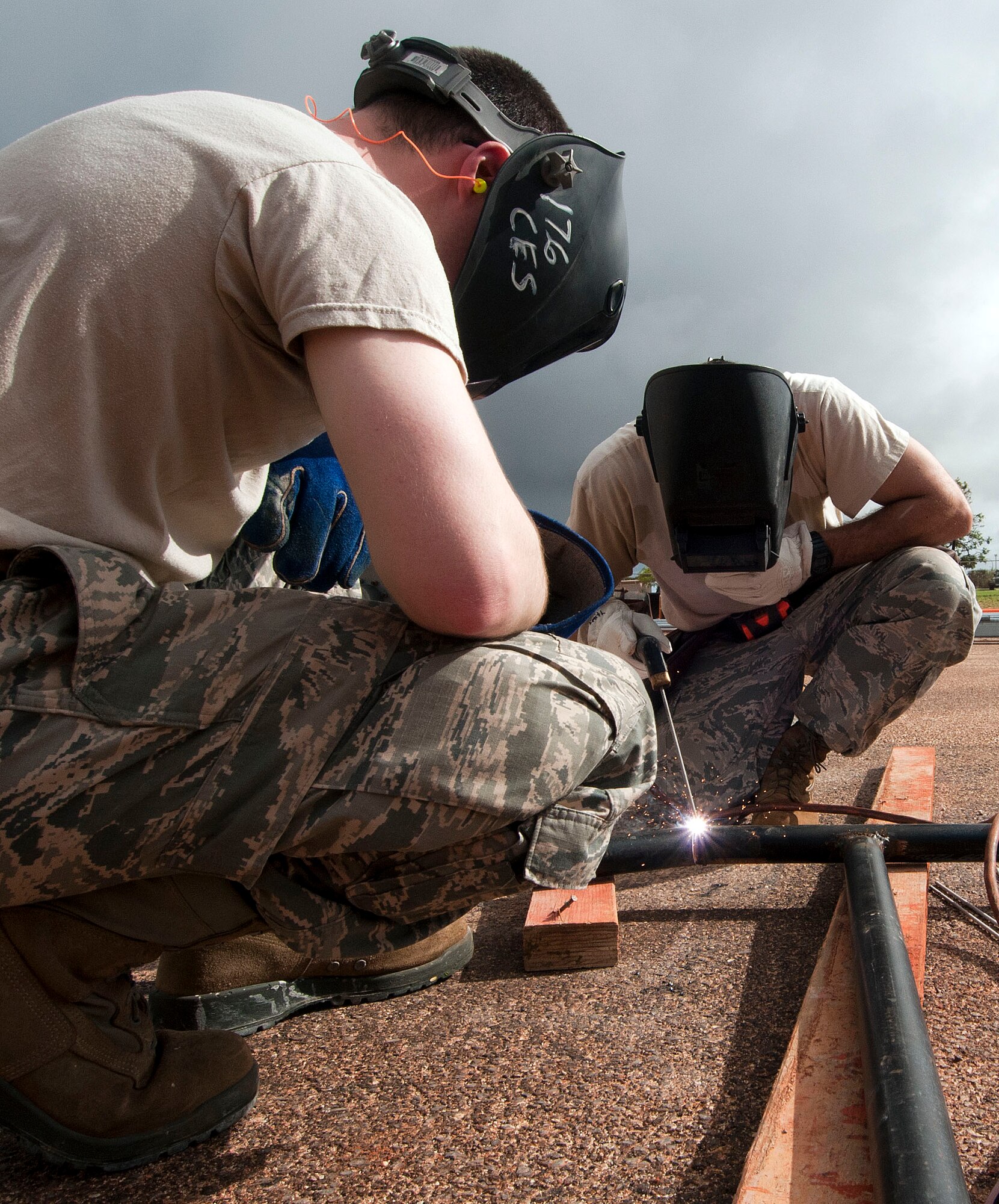 H.E. HOLT NAVAL COMMUNICATION STATION, Australia – Airman 1st Class Phillip Gifford, left, and Tech. Sgt. Mark Hill of the Alaska Air National Guard’s 176th Civil Engineer Squadron weld a safety railing here May 6, 2017. Thirty-four Alaska Air Guard members, most from the 176th CES, deployed for two weeks to this tiny outpost at the far western tip of Australia to help build a space radar facility to be jointly operated by Australia and the United States. U.S. Air National Guard photo by Capt. John Callahan/ Released.
