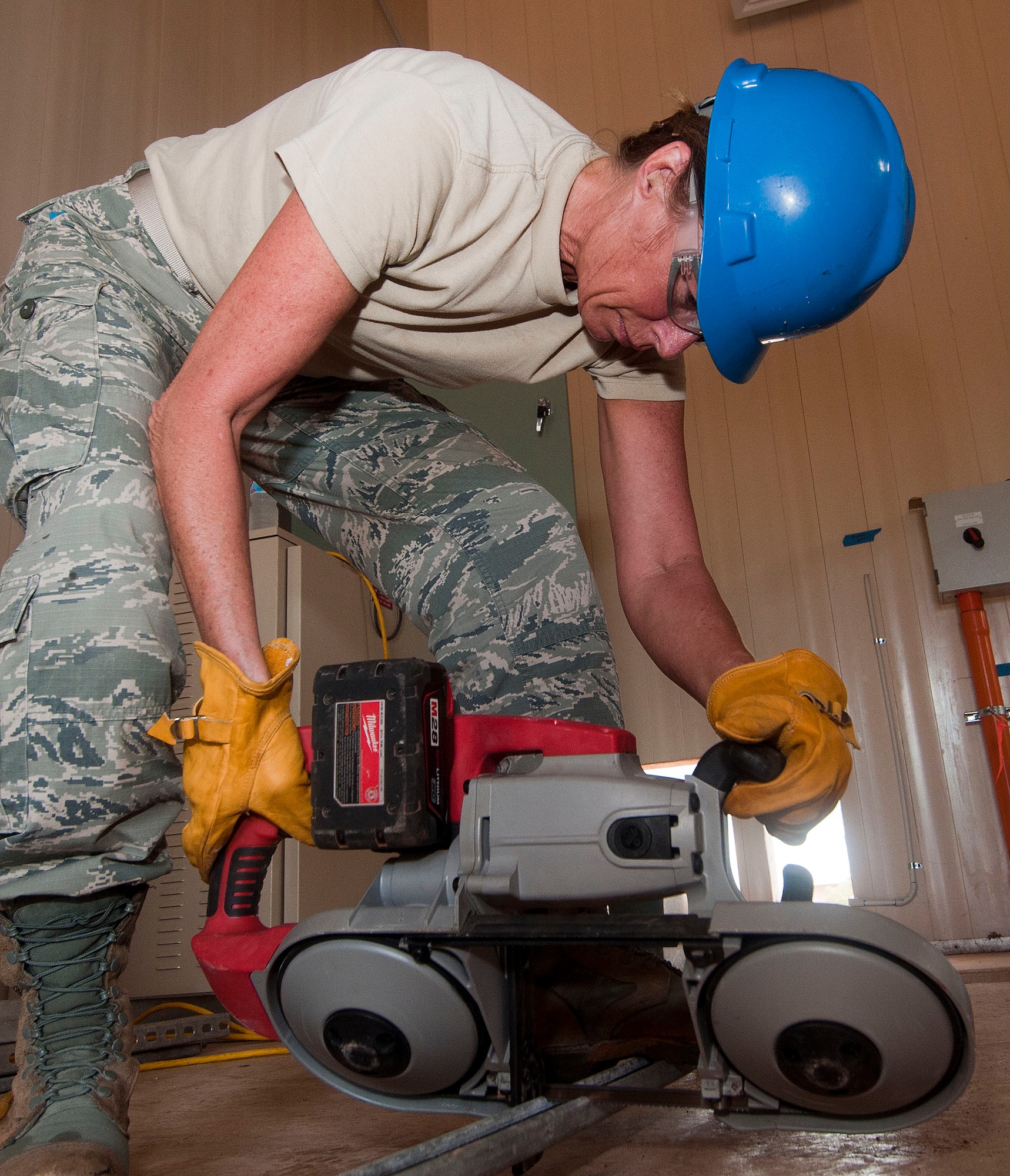 H.E. HOLT NAVAL COMMUNICATION STATION, Australia – Master Sgt. Bonnie Gardino, utilities supervisor for the Alaska Air National Guard’s 176th Civil Engineer Squadron, cuts structural support braces here May 6, 2014. Thirty-four Alaska Air Guard members, most from the 176th CES, deployed for two weeks to this tiny outpost at the far western tip of Australia to help build a space radar facility to be jointly operated by Australia and the United States. U.S. Air National Guard photo by Capt. John Callahan/ Released.