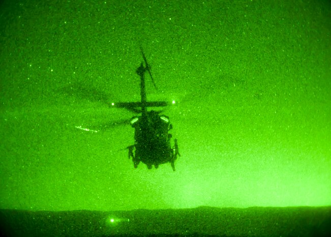 A U.S. Air Force HH-60 Pave Hawk assigned to Nellis Air Force Base, Nev. prepares to drop off simulated survivors during the USAF Weapons School terminal employment phase portion of the pilots training April 28, 2014, at Orchard Combat Training Center, Idaho. The weapons school curriculum teaches graduate-level instructor courses that provide the world's most advanced training in weapons and tactics employment. (U.S. Air Force photo by Senior Airman Jason Couillard)