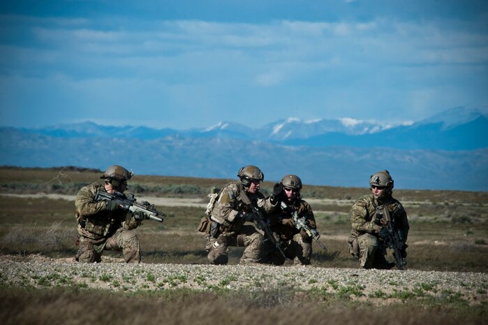 U.S. Air Force pararescuemen assigned to the 347th Rescue Group, Moody Air Force Base, Ga. participate in the U.S. Air Force Weapons School terminal employment phase portion of pilot training April 28, 2014, at Orchard Combat Training Center, Idaho. Every six months, the Weapons School graduates approximately 100 weapons officers and enlisted specialists who are tactical system experts, weapons instructors and leaders of Airmen.  (U.S. Air Force photo by Senior Airman Jason Couillard)