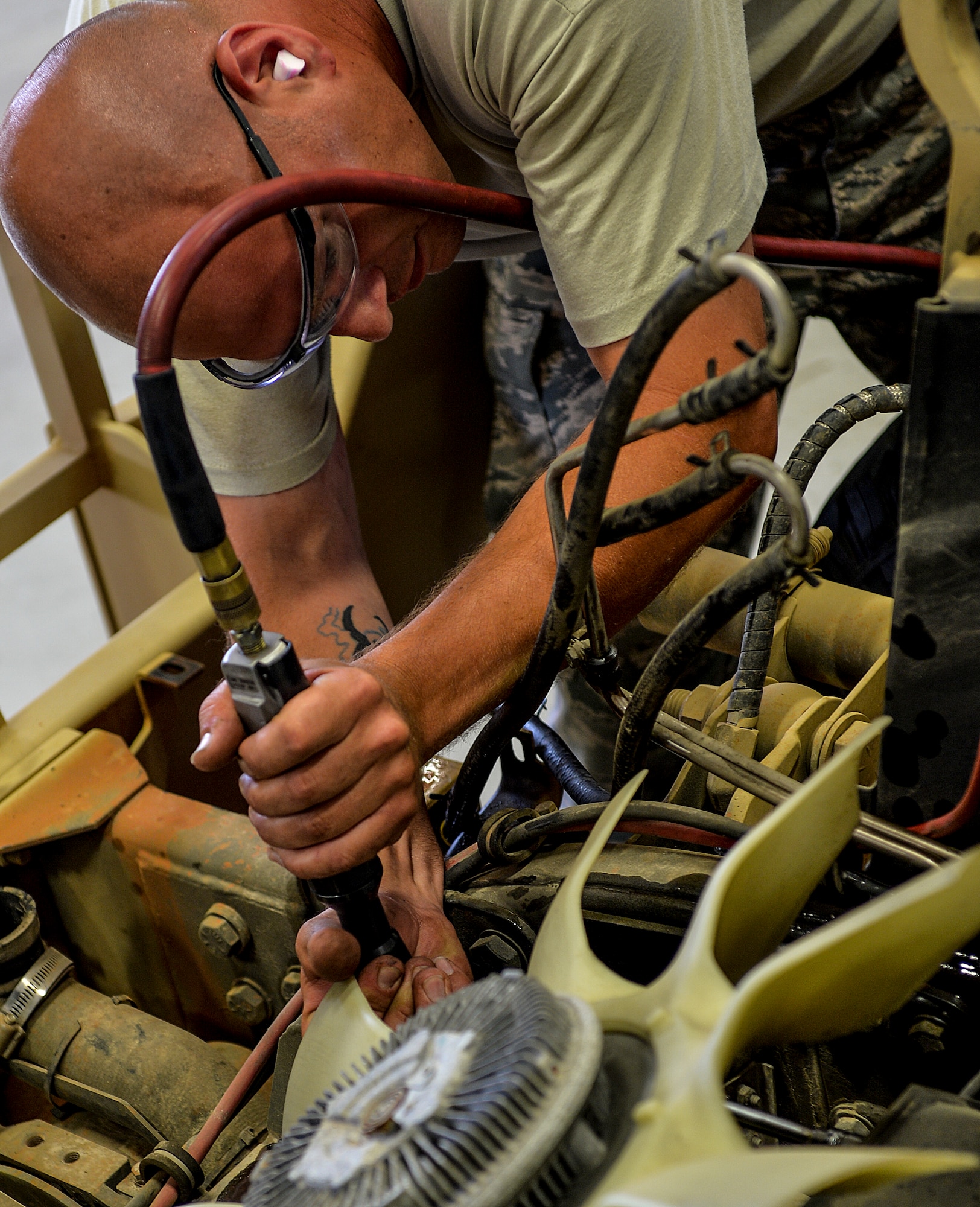 Staff Sgt. Matthew Di Terlizzi, 1st Special Operations Logistics Readiness Squadron vehicle maintenance specialist, works on a Humvee at Hurlburt Field, Fla., April 28, 2014. Vehicle maintenance manages a fleet of approximately 600 base-wide vehicles and trains all vehicle control officers. (U.S. Air Force photo/Senior Airman Christopher Callaway)